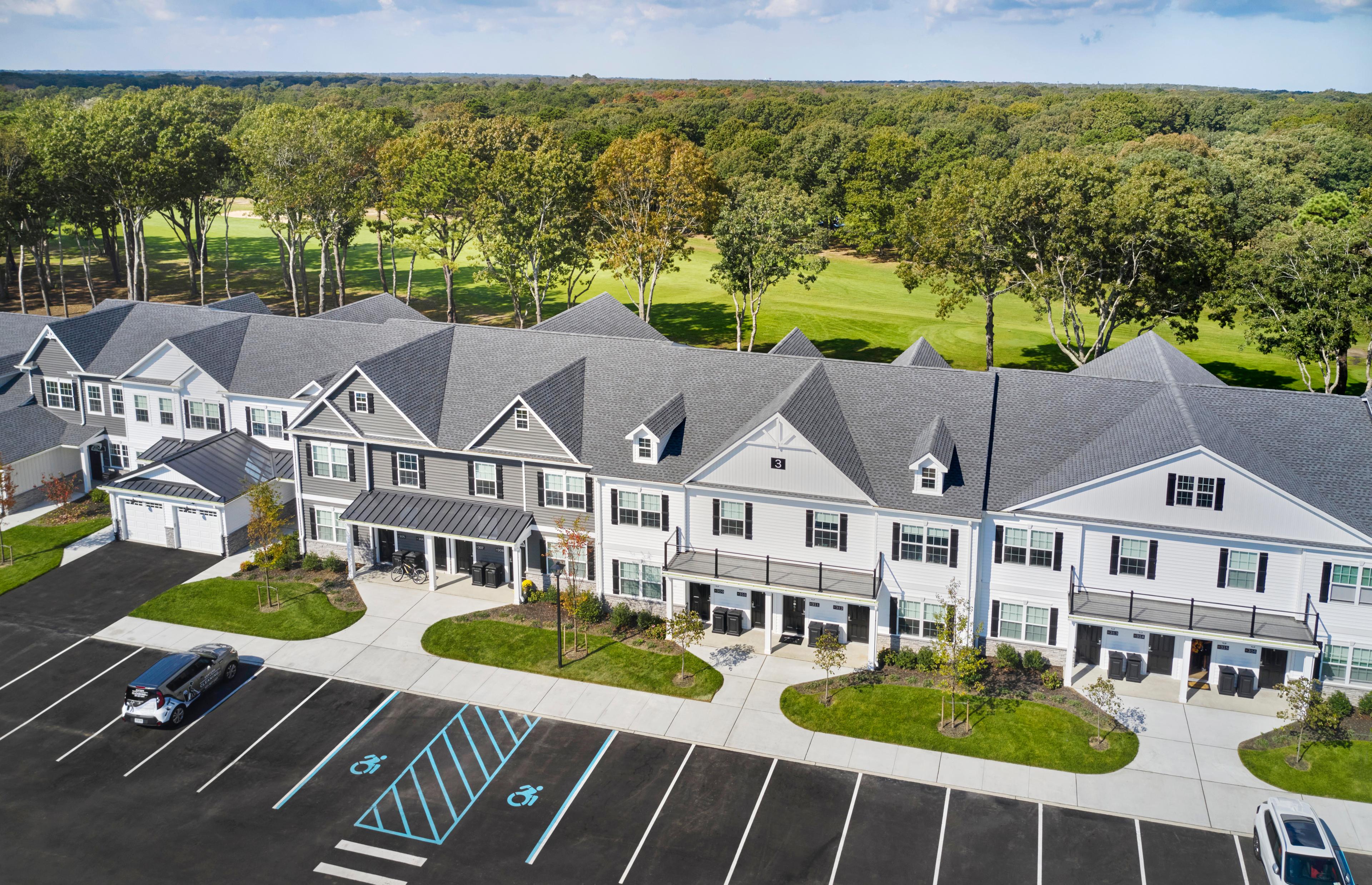 Image of Pine Hills Community surrounded by plush greenery