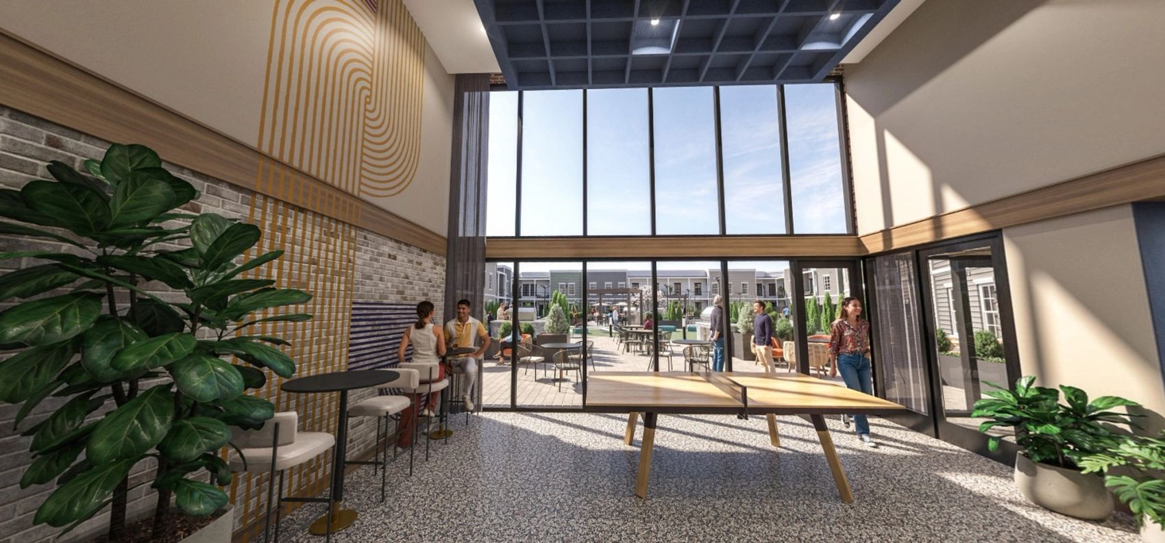 This bright, open hangout spot is made for friendly competition and laid-back vibes — with a ping pong table, comfy seating, and floor-to-ceiling windows overlooking the courtyard.