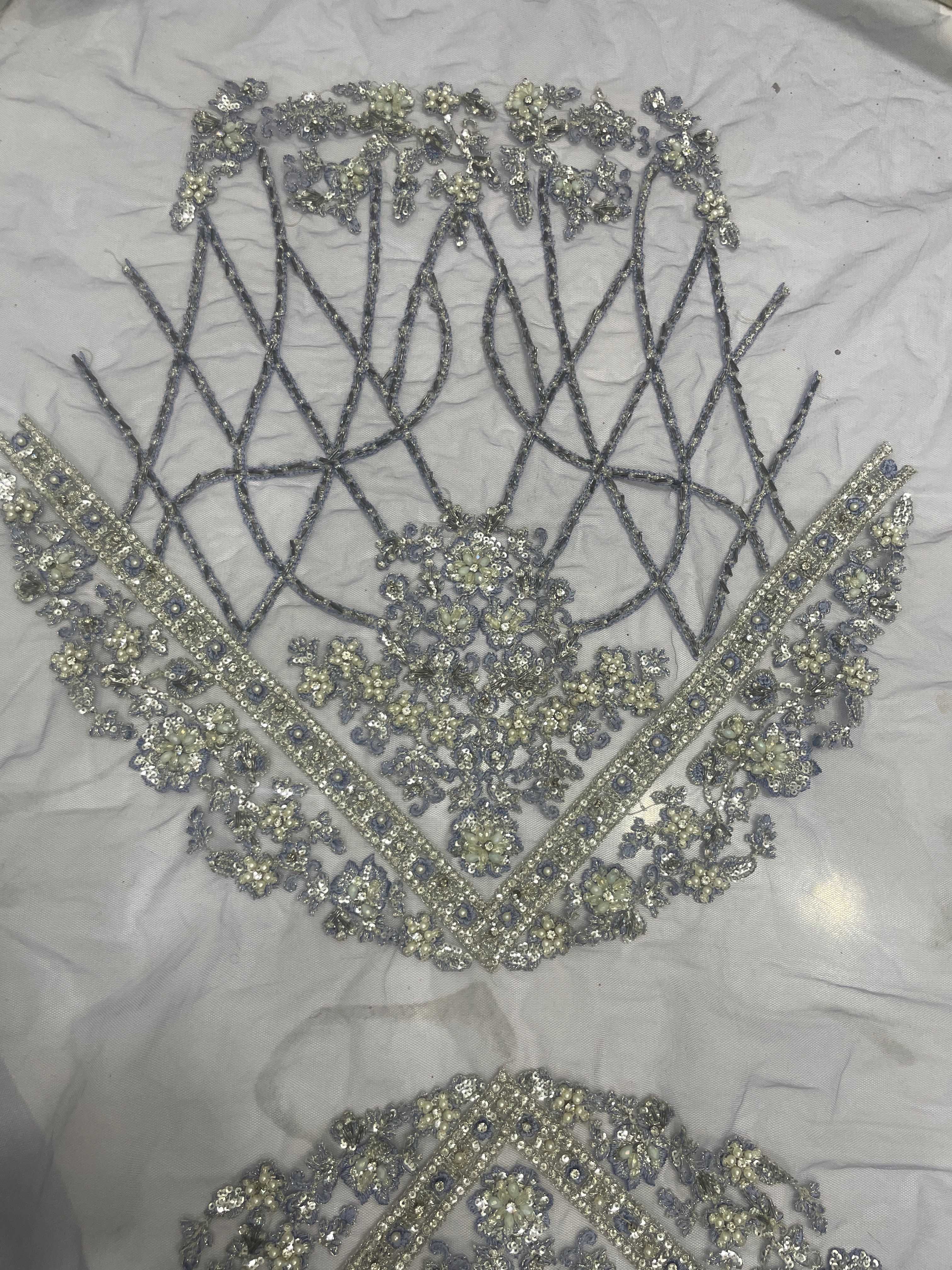 Hand emlished soft net sleeves 