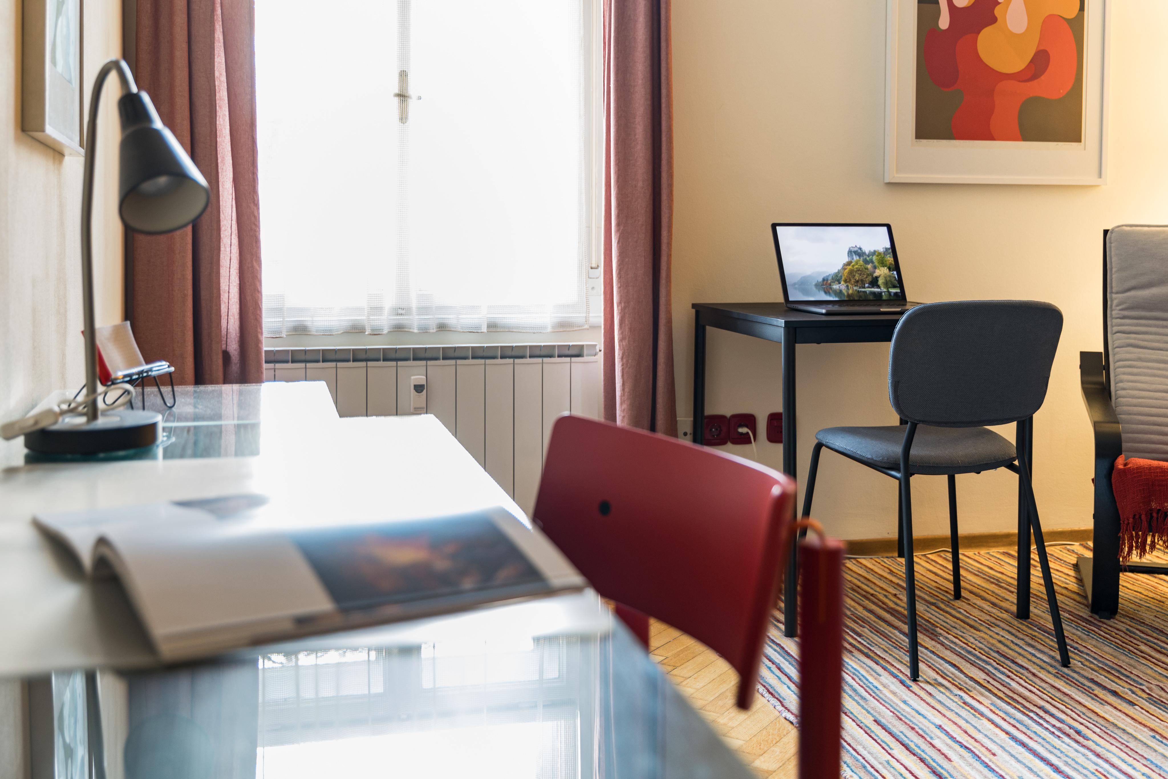 two desks with chairs