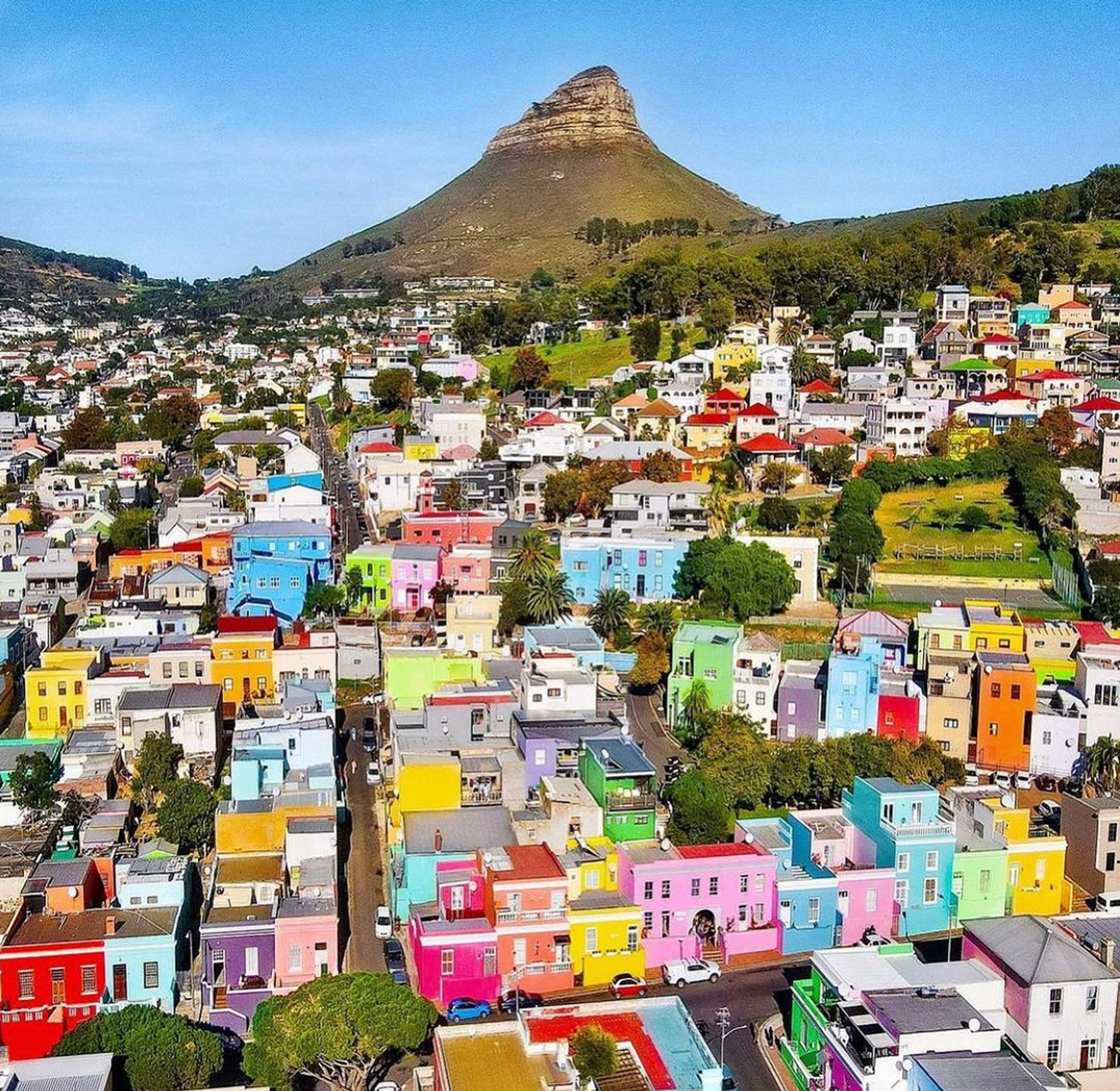 Aerial view of brightly colored homes in Bo-Kaap, with a mountainous backdrop