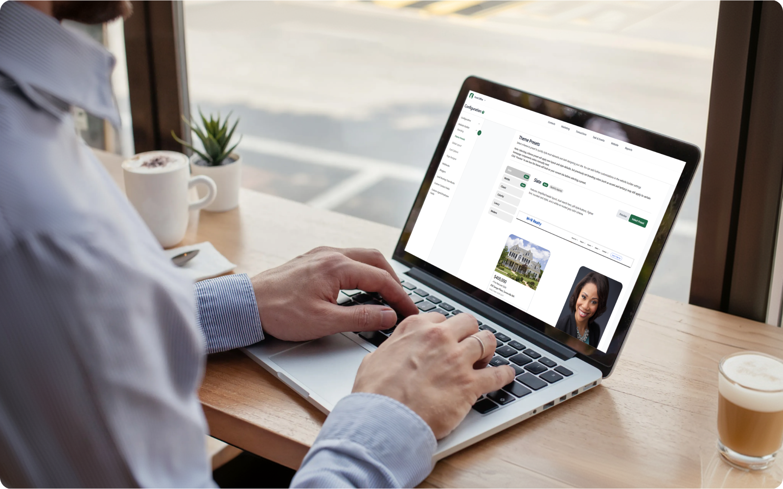 Agent working on a laptop as he puts together his real estate agent website