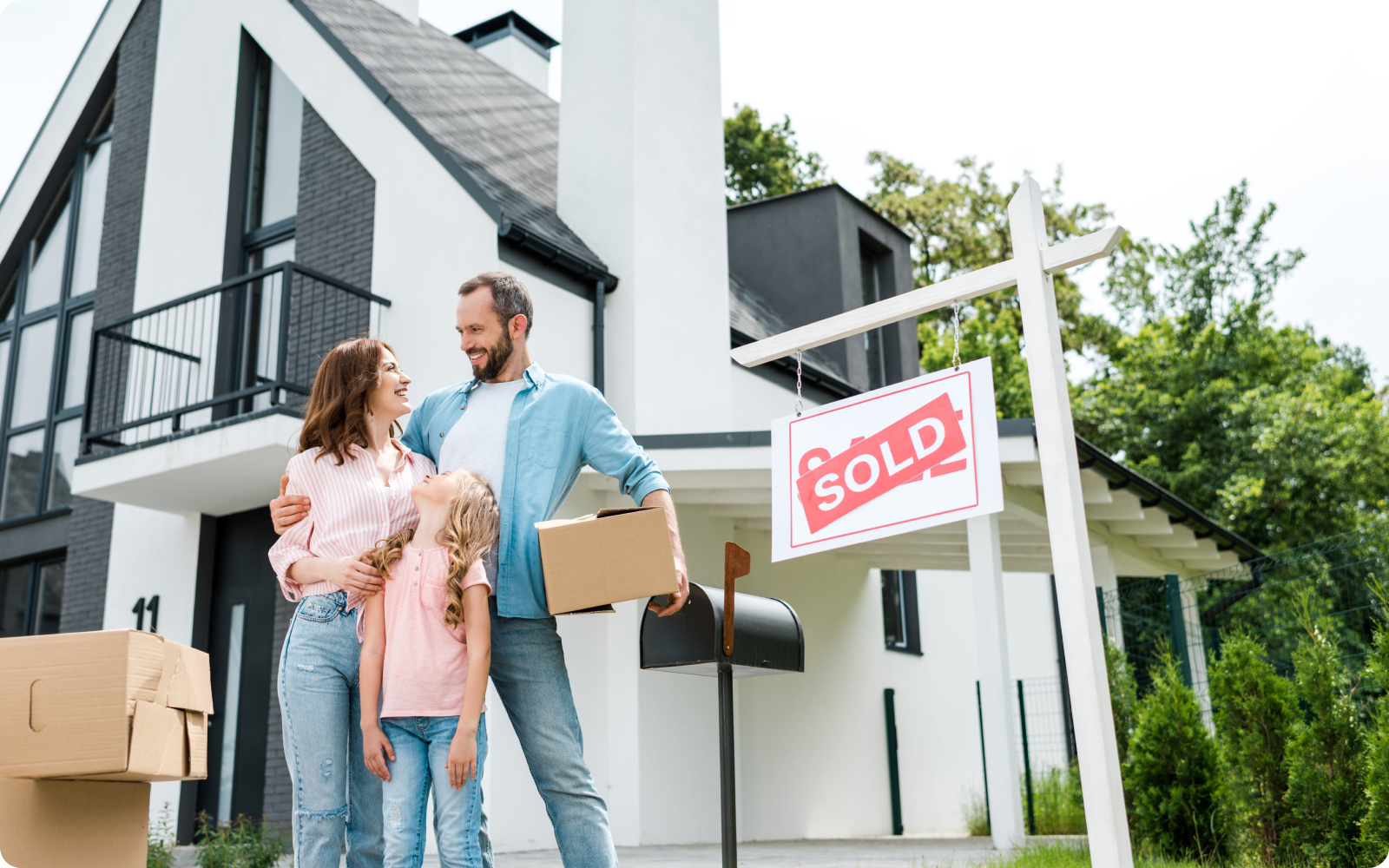 Family next to sold sign in front of home for buyer agent transaction checklist blog
