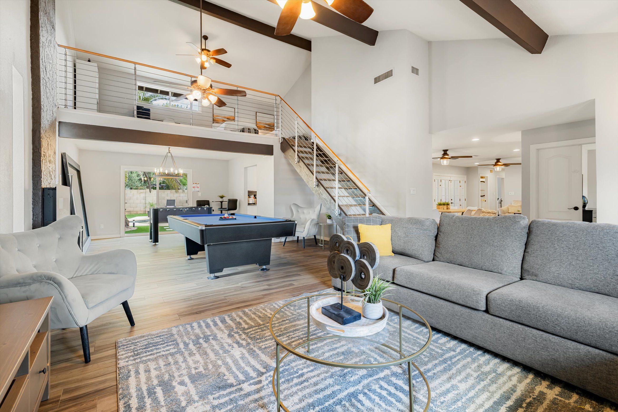 Vaulted living room with exposed beams