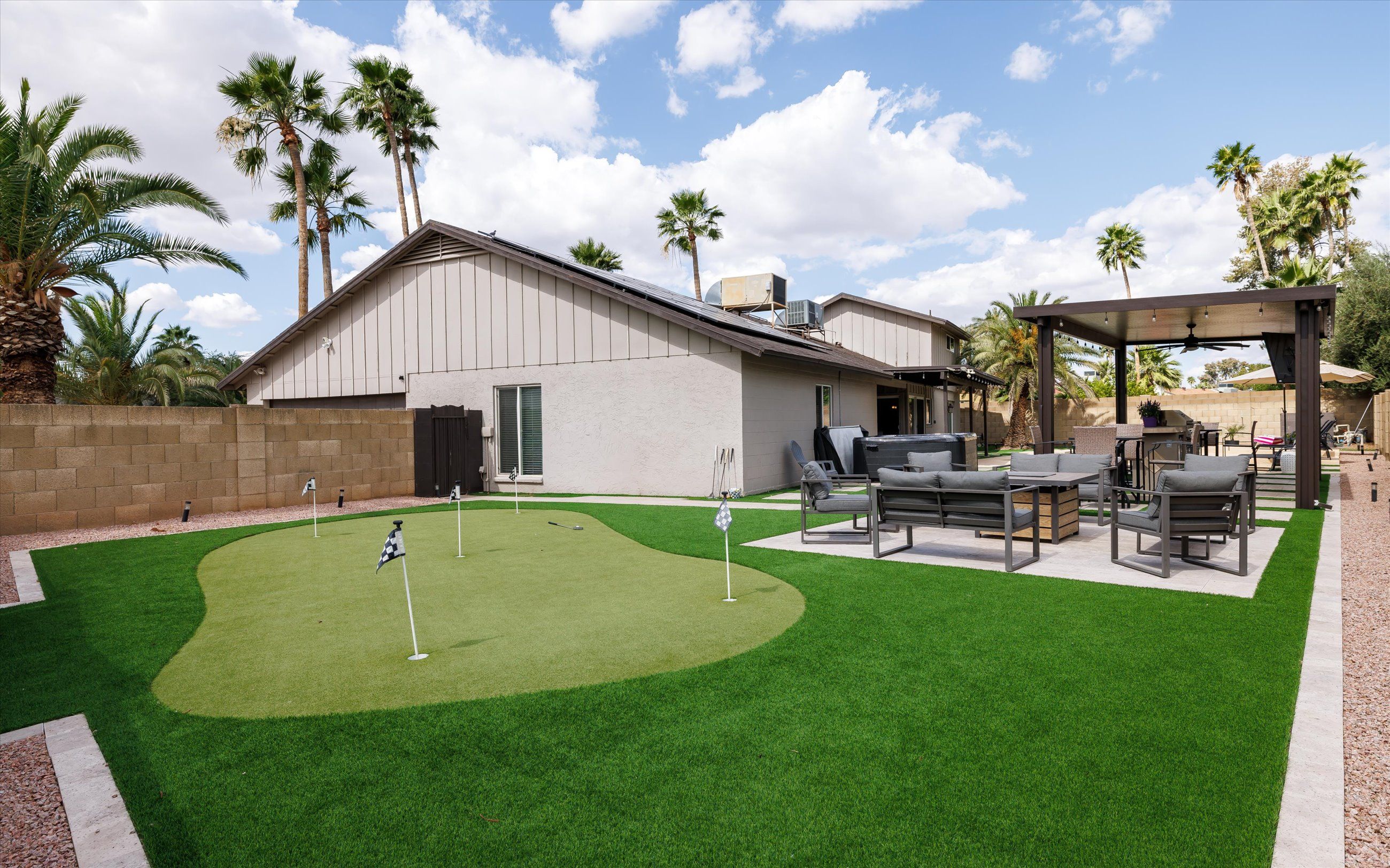 Resort-style pool and spa backyard