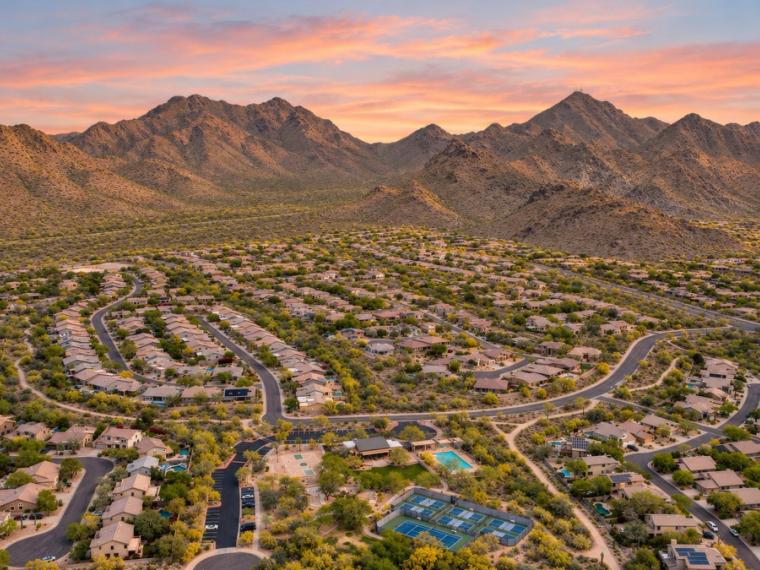 Scottsdale homes beneath the McDowell Mountains at sunset