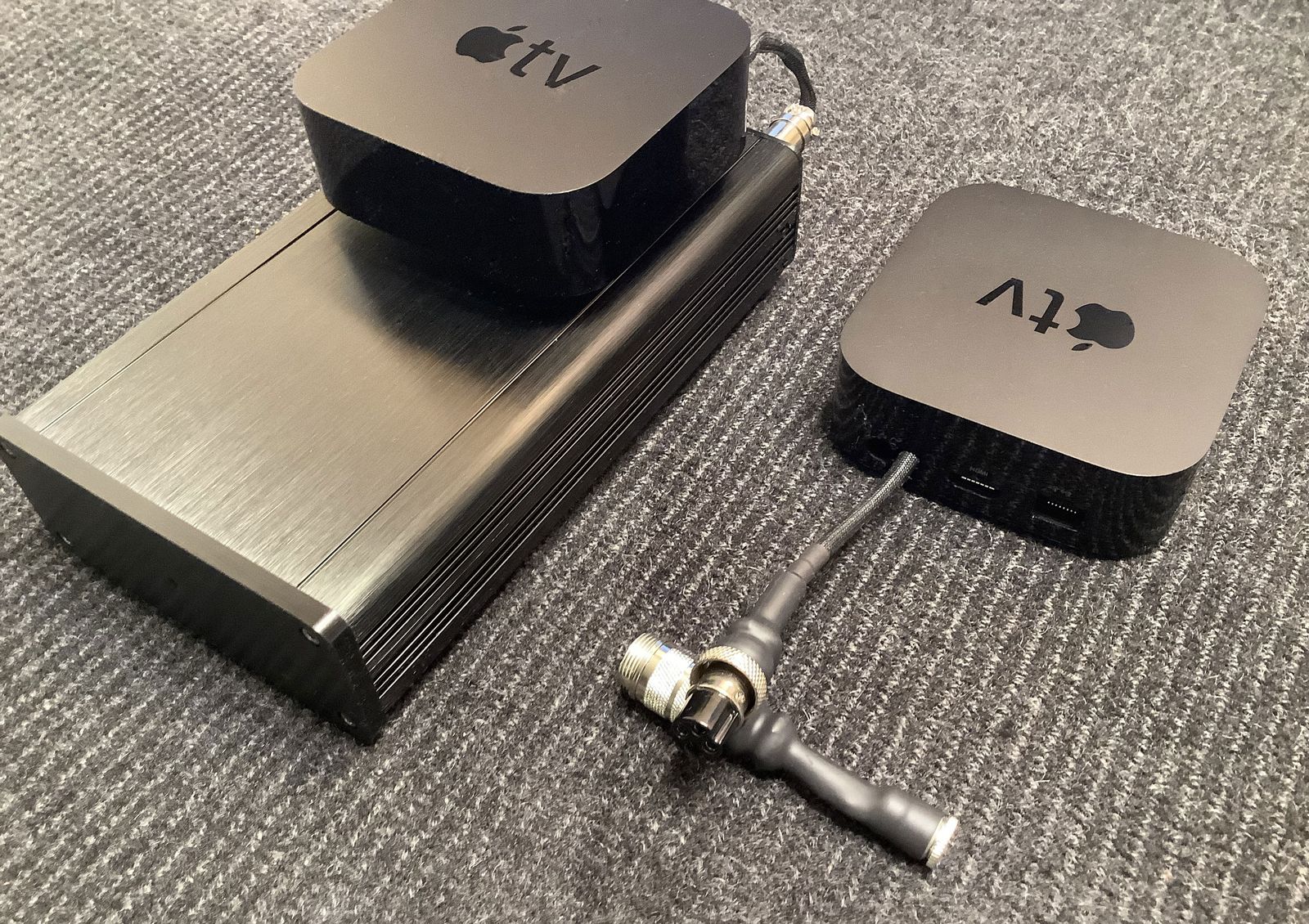 DeJitter It Apple TV X linear power supply with two Apple TV units