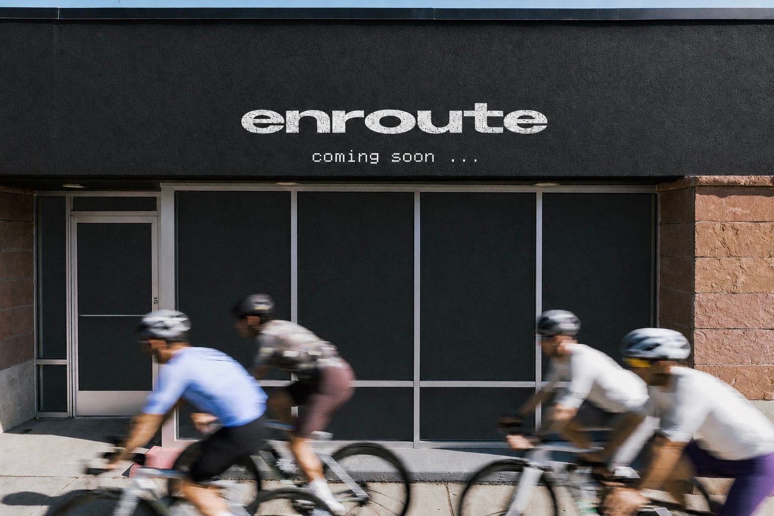 Enroute Boulder storefront with coming soon signage