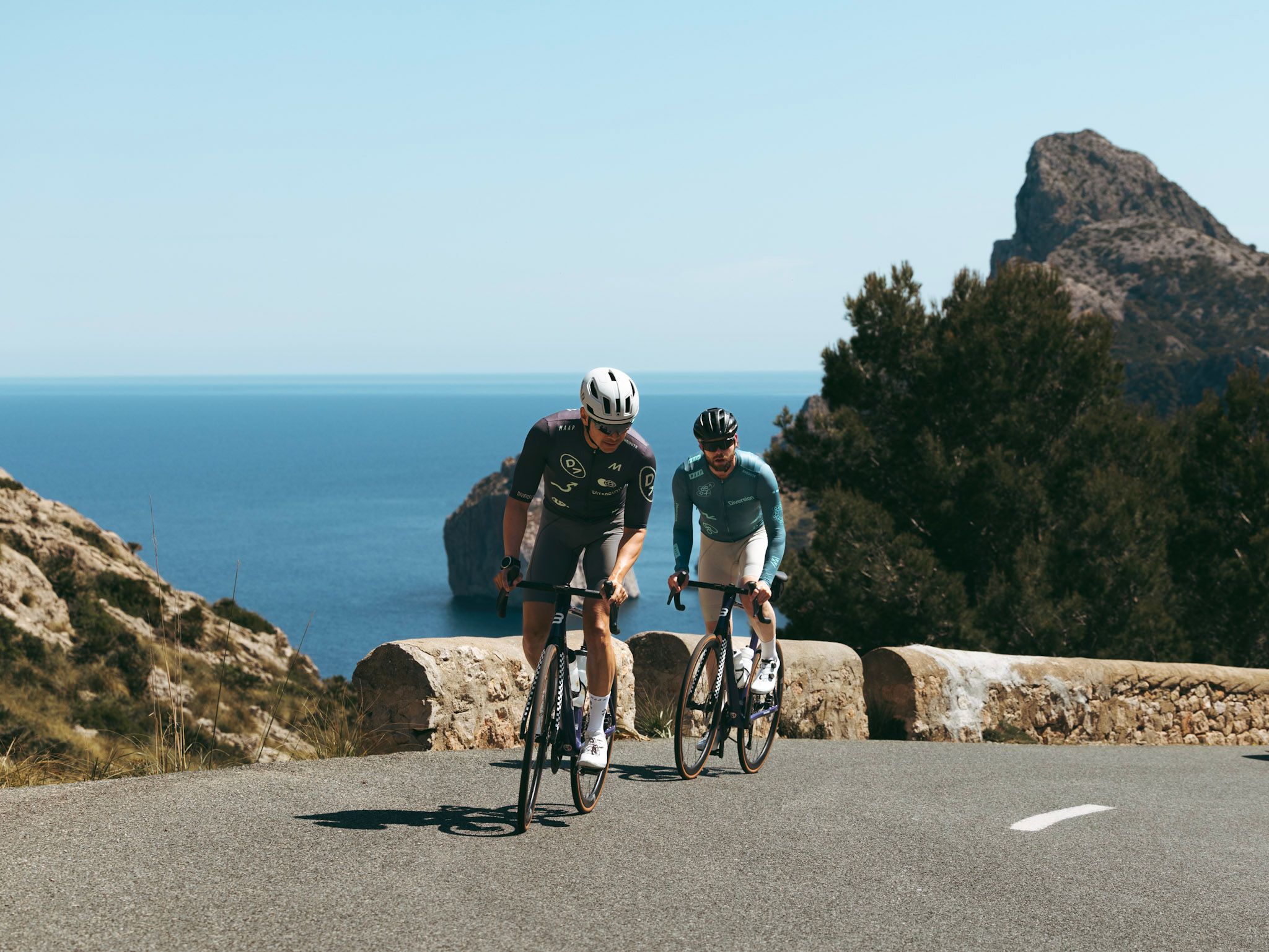 Riders wearing Diversion Jersey on Cap de Formentor