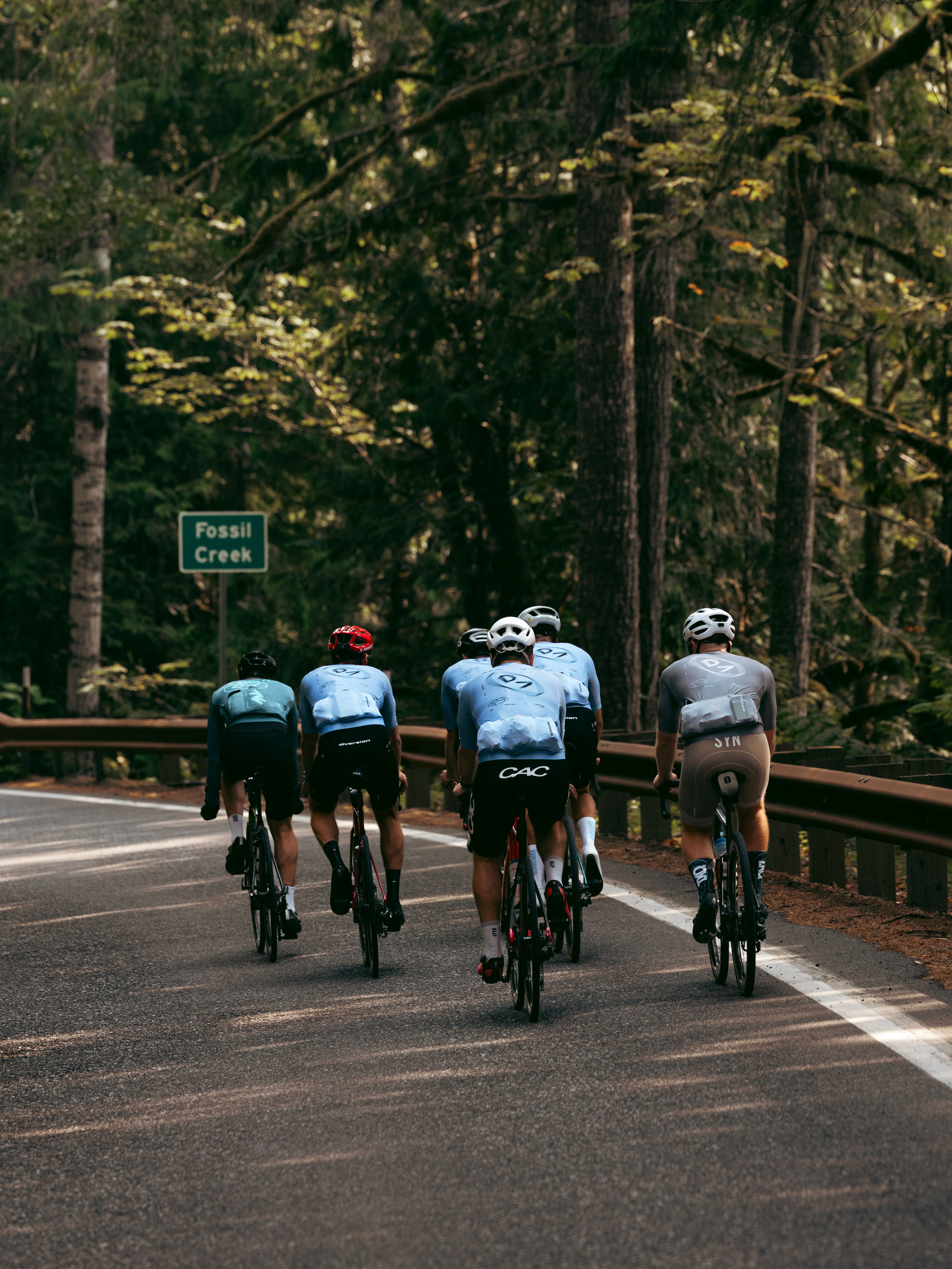 Cyclists wearing the Diversion Cycling Jersey