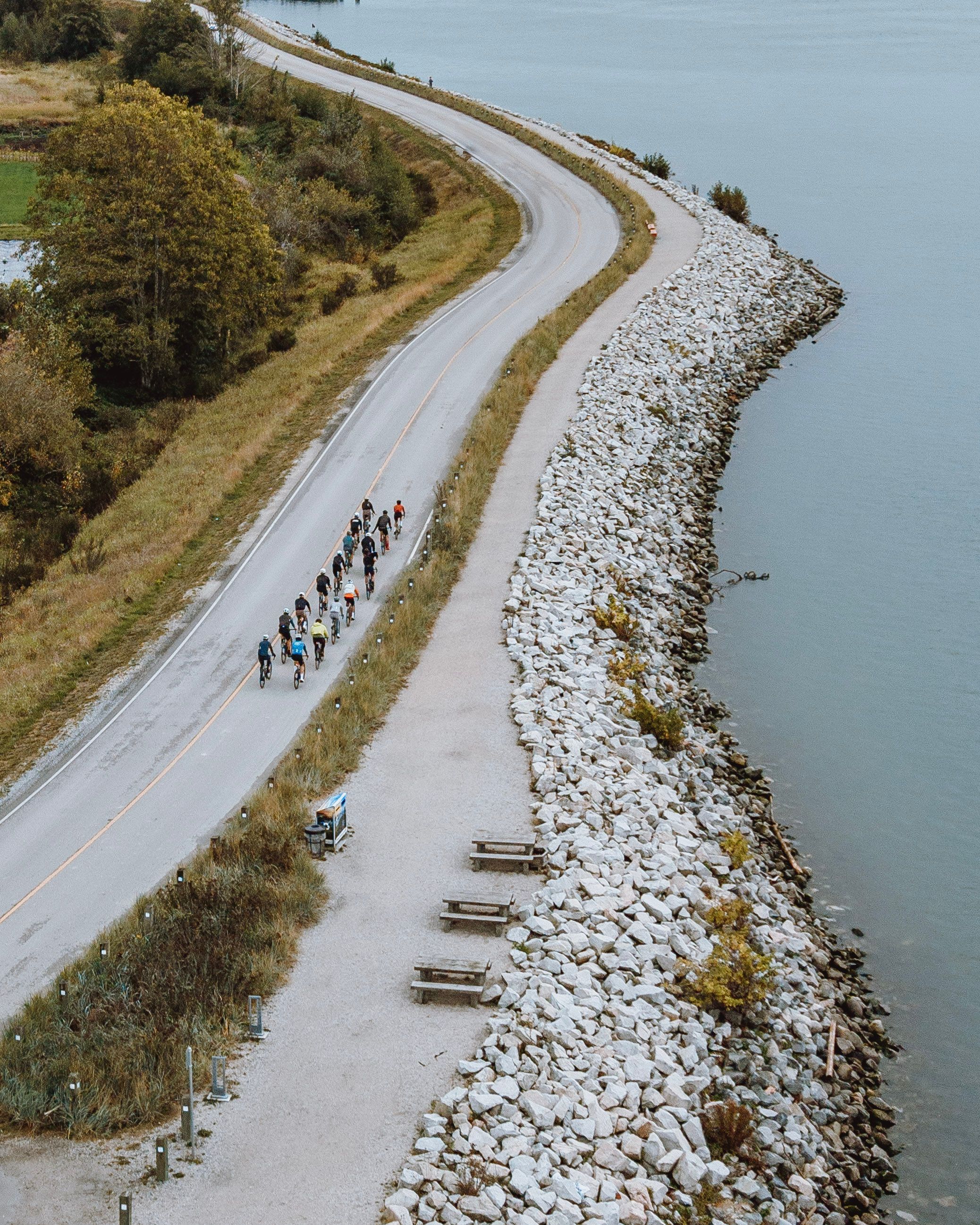 Cyclists riding beside Fraser River