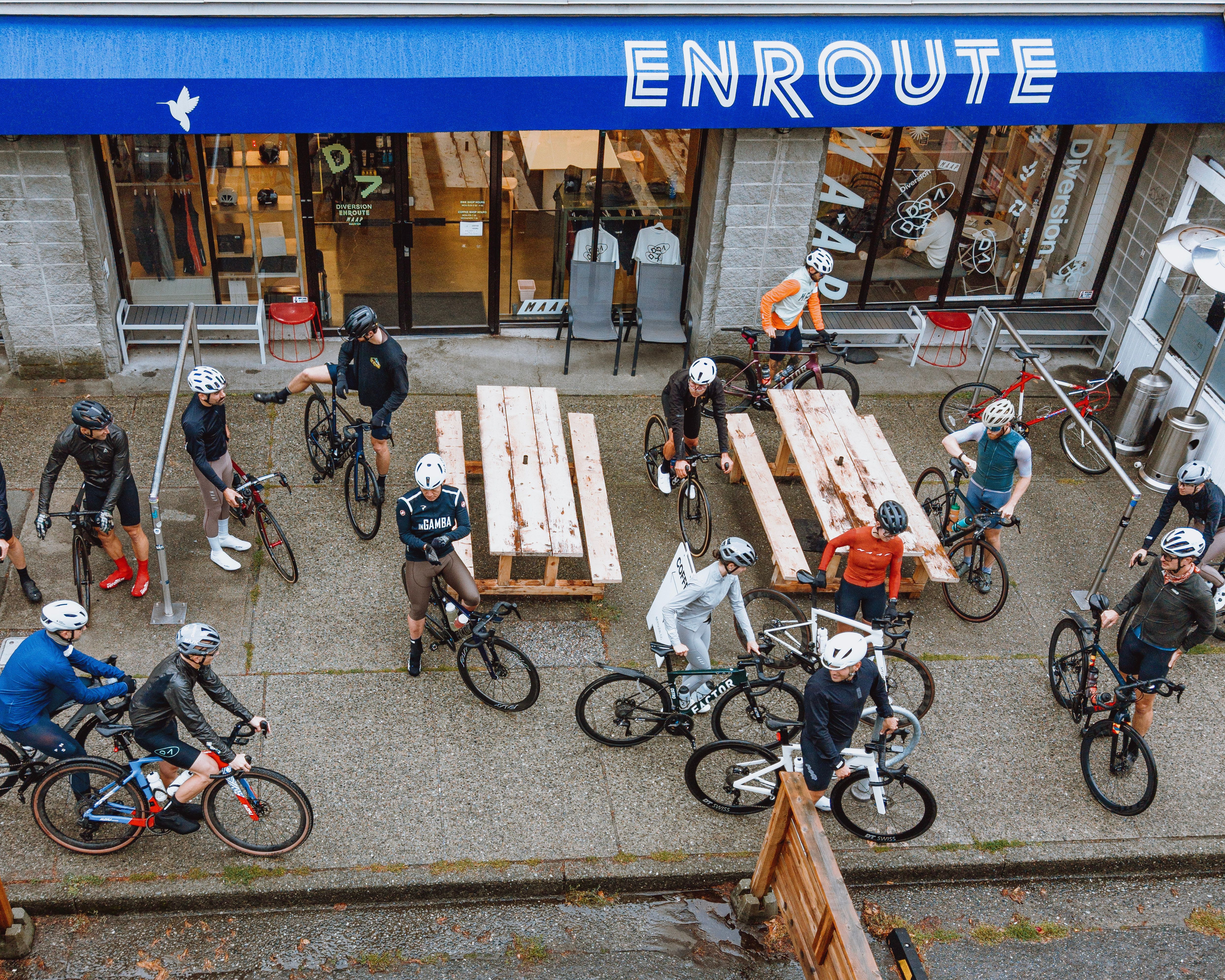 Cyclists all outside of ENROUTE.CC Clubhouse in Vancouver