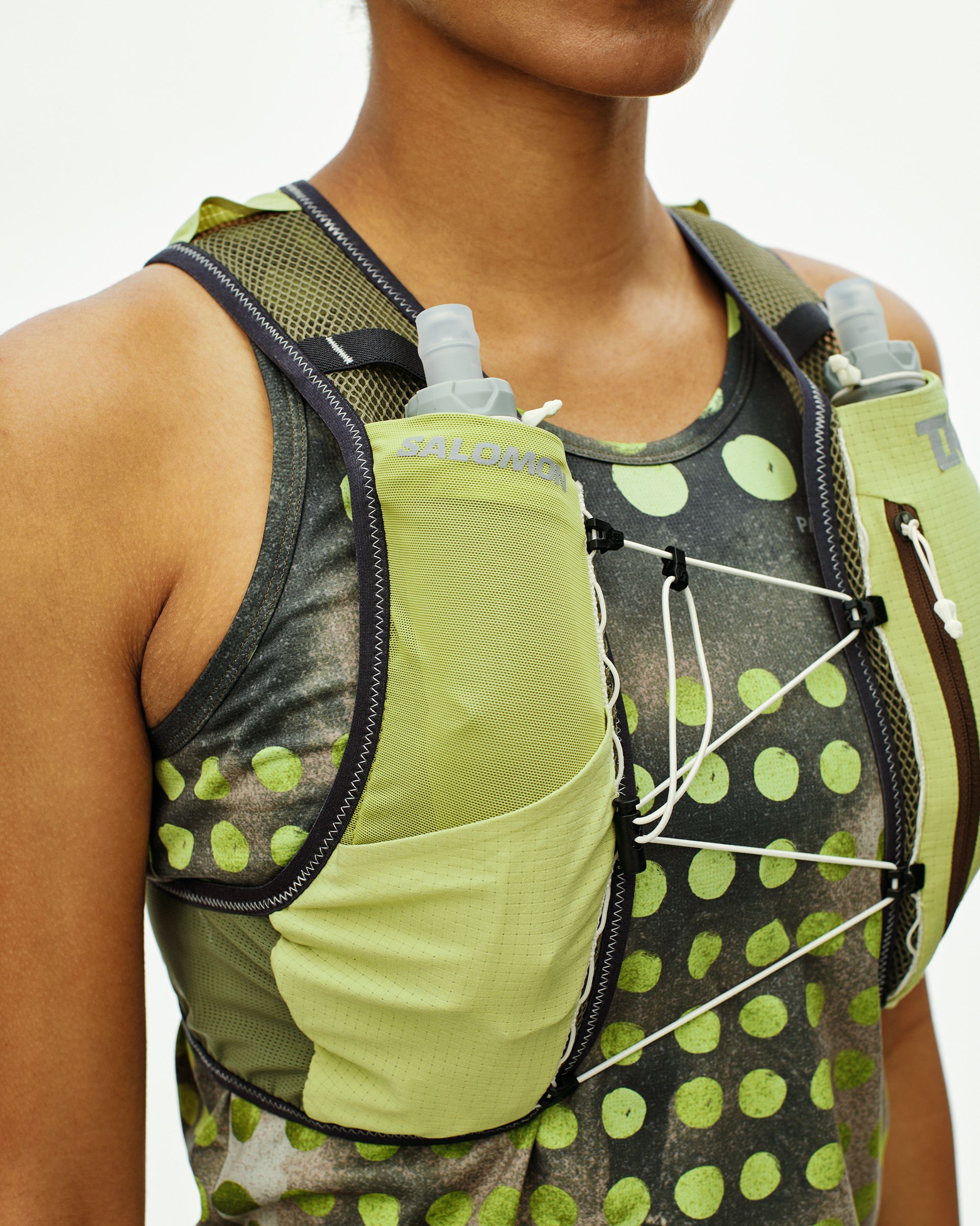 T.K.O. Race Skin 2 chest detail with two co-branded 500ml soft flasks and bungee lacing system