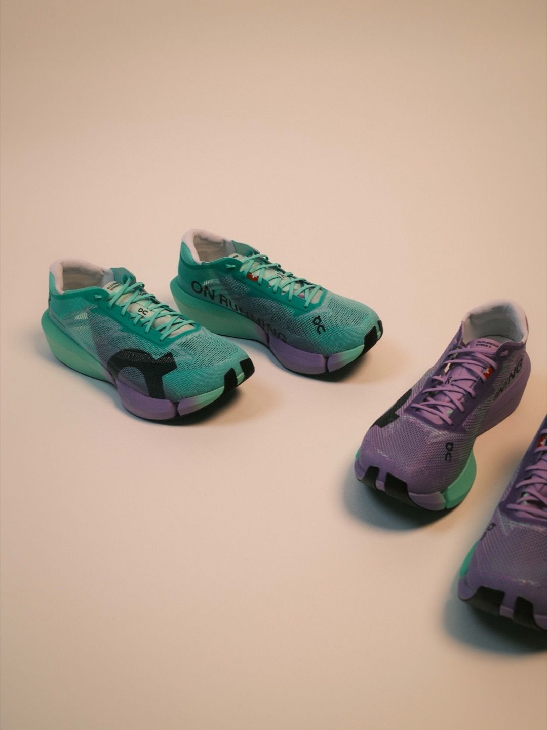 On Cloudboom Strike 2 in Verdite and Aconite colourways