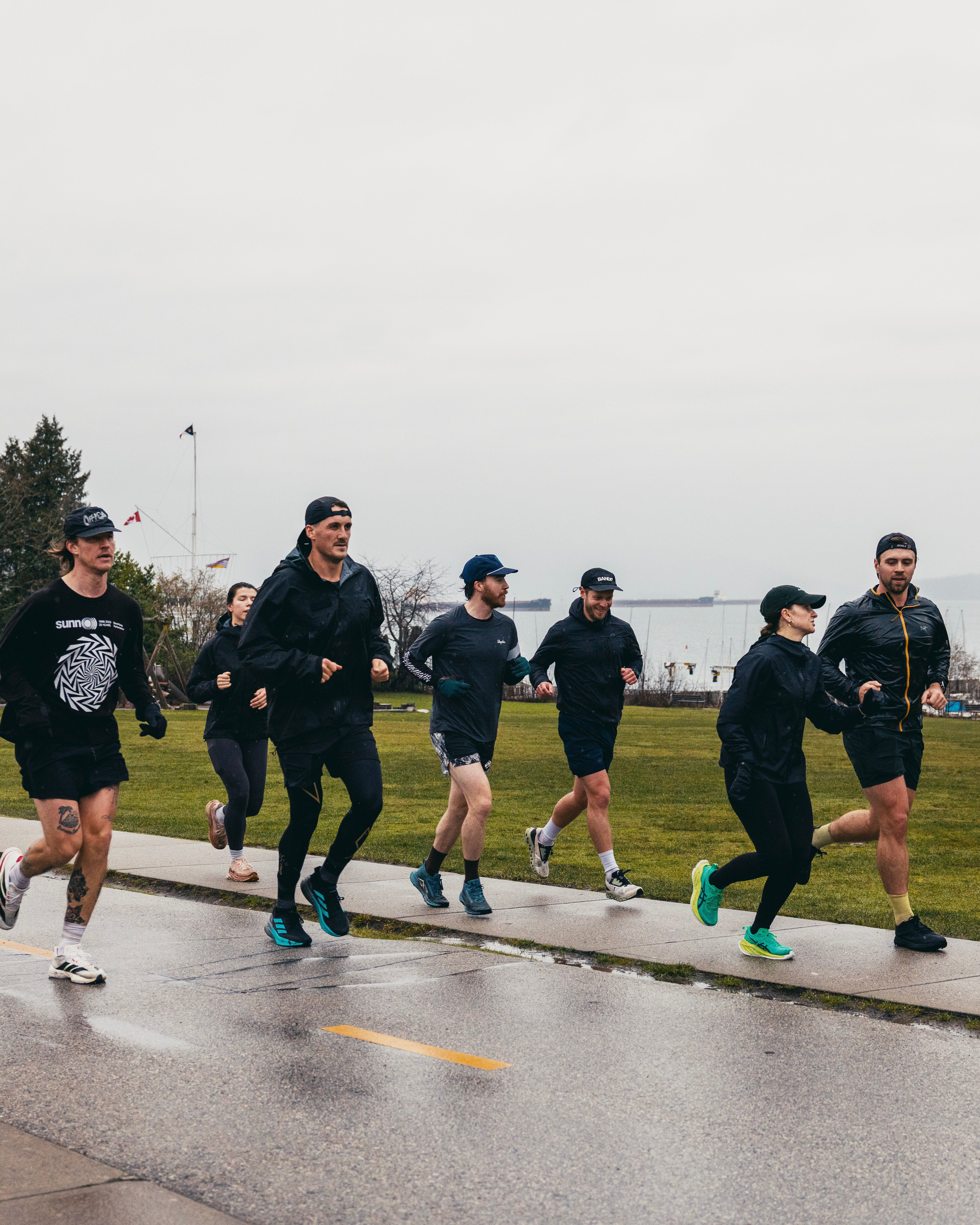 runners running in Jericho Beach, Vancouver
