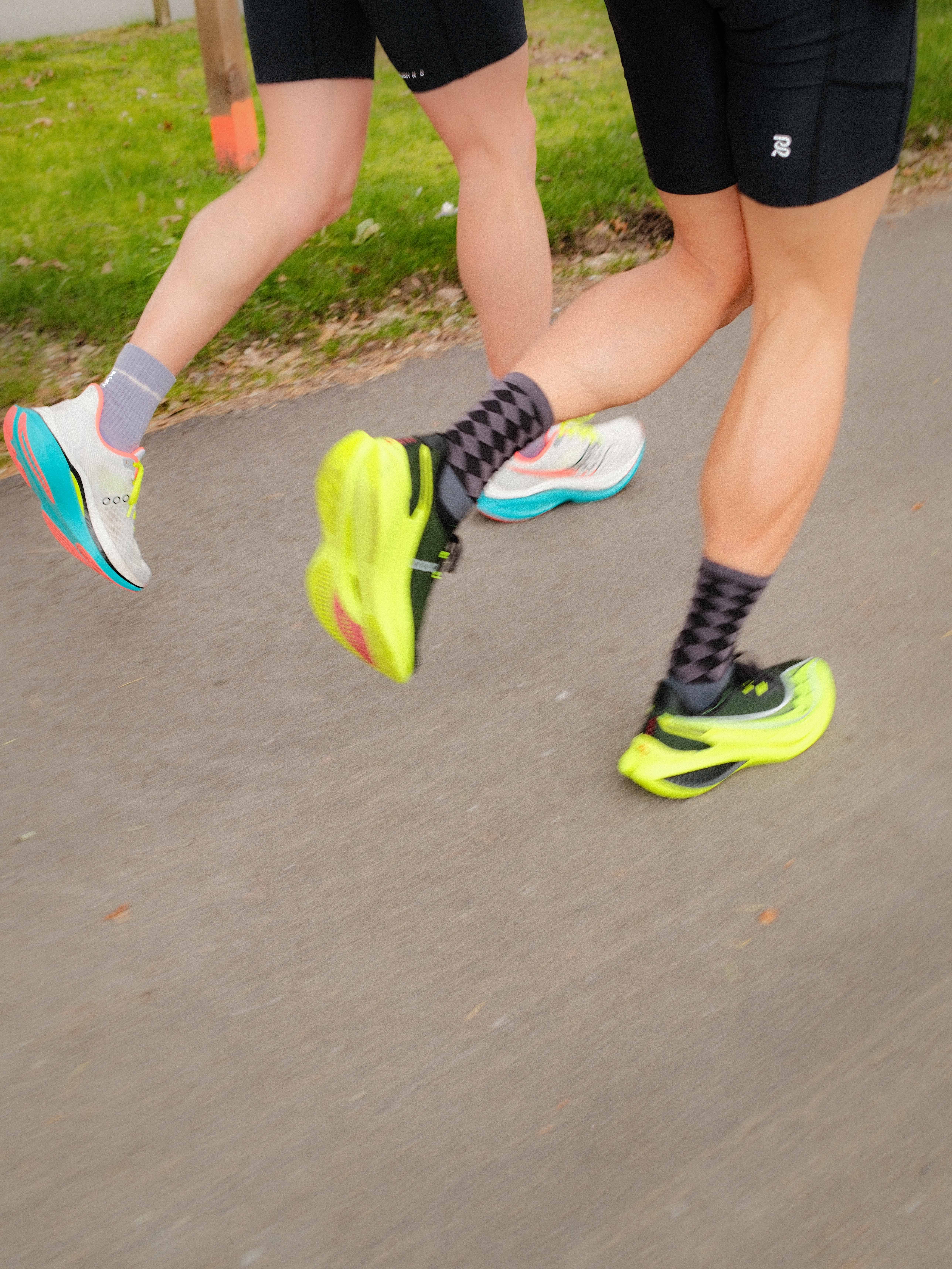 Runners legs wearing Saucony Endorphin Pro & Speed 5