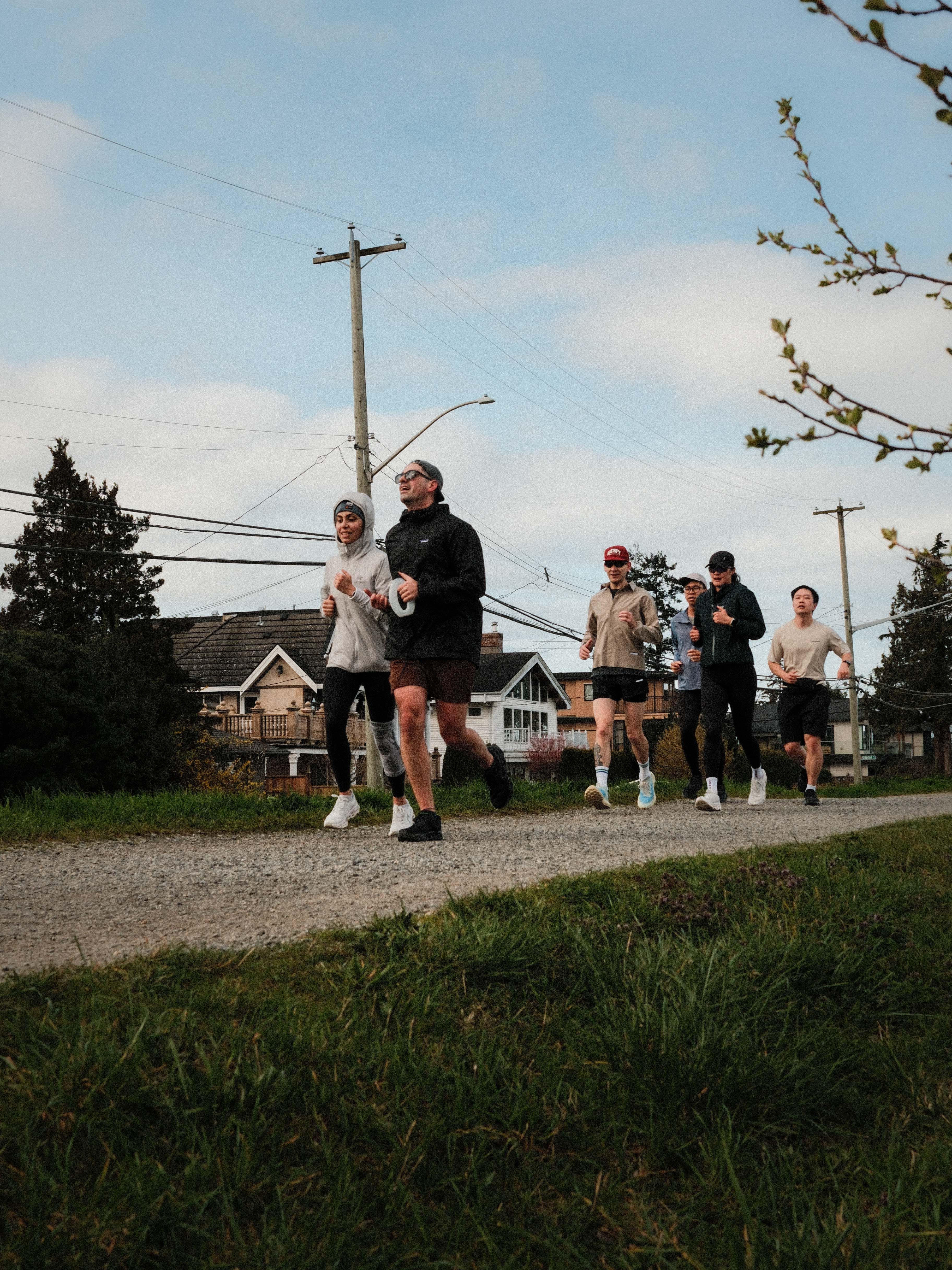 Runners running on the On Running Cloudmonster