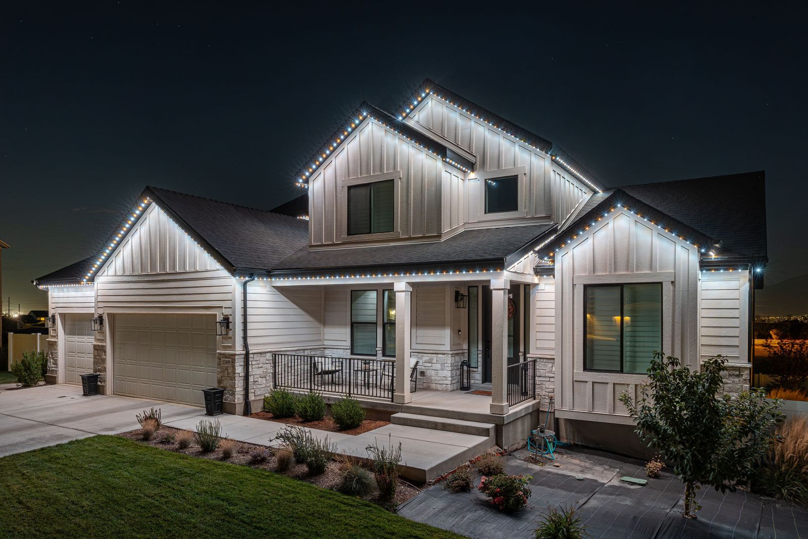 Same home at night with permanent LED trim lighting turned on