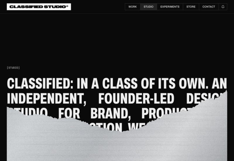 The studio statement half under torn silver foil