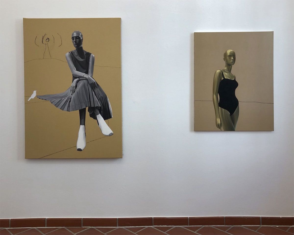 Two of Mark Alexander's paintings on a wall of a museum