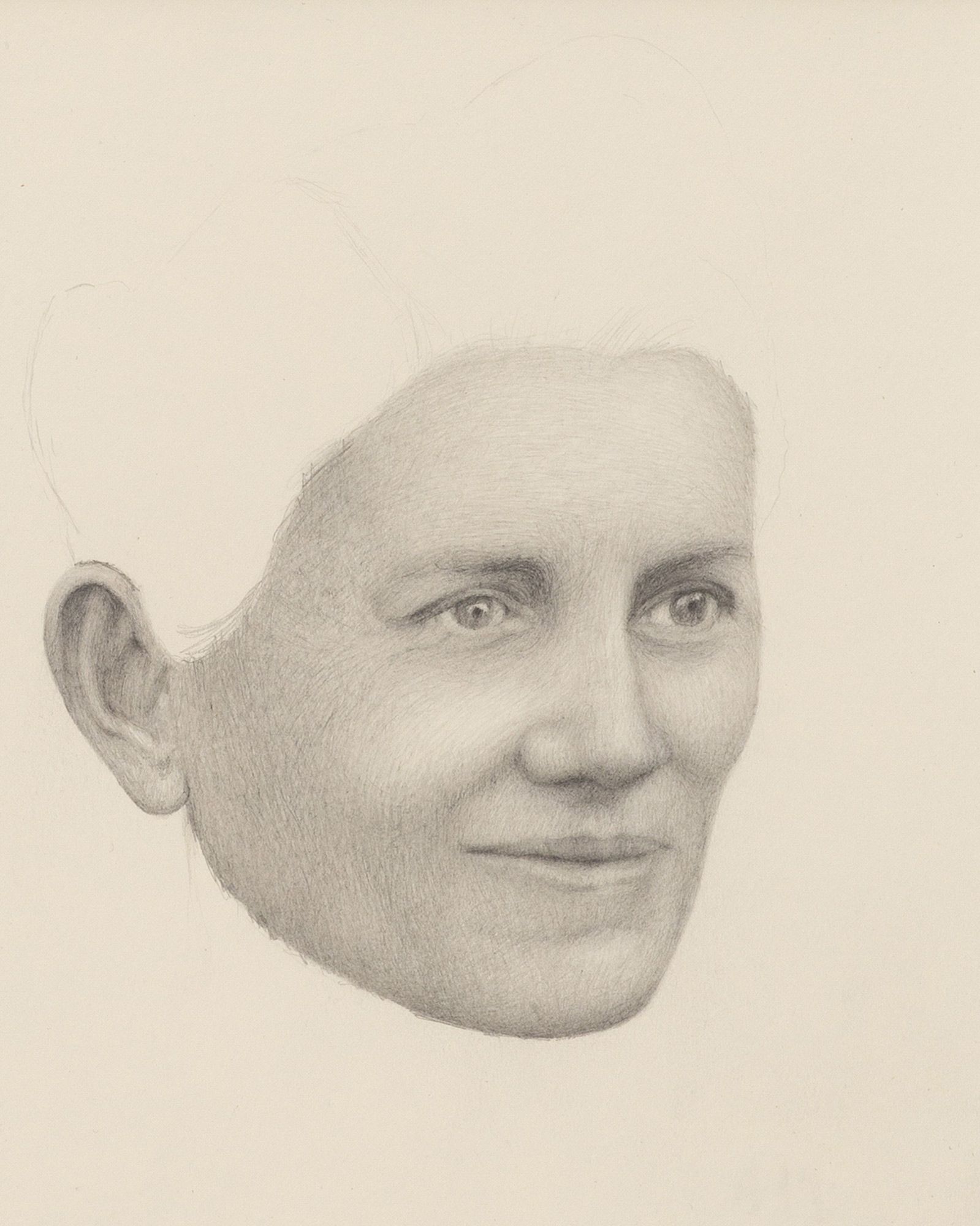 Detailed pencil drawing of a person's face, capturing expressive eyes, a subtle smile, and ear contours.