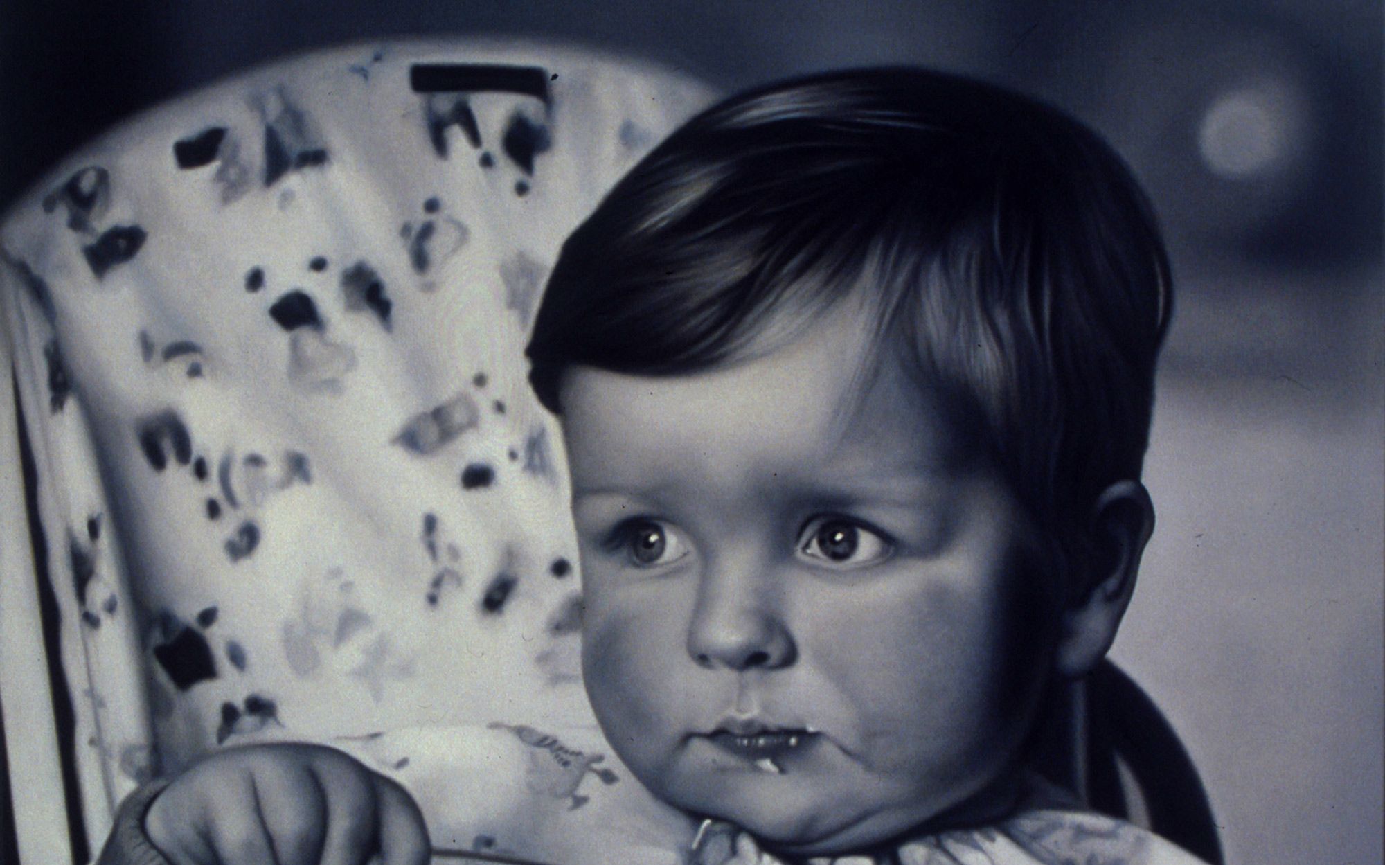 Photo realistic Self portrait of artist Mark Alexander at six months eating with spoon.