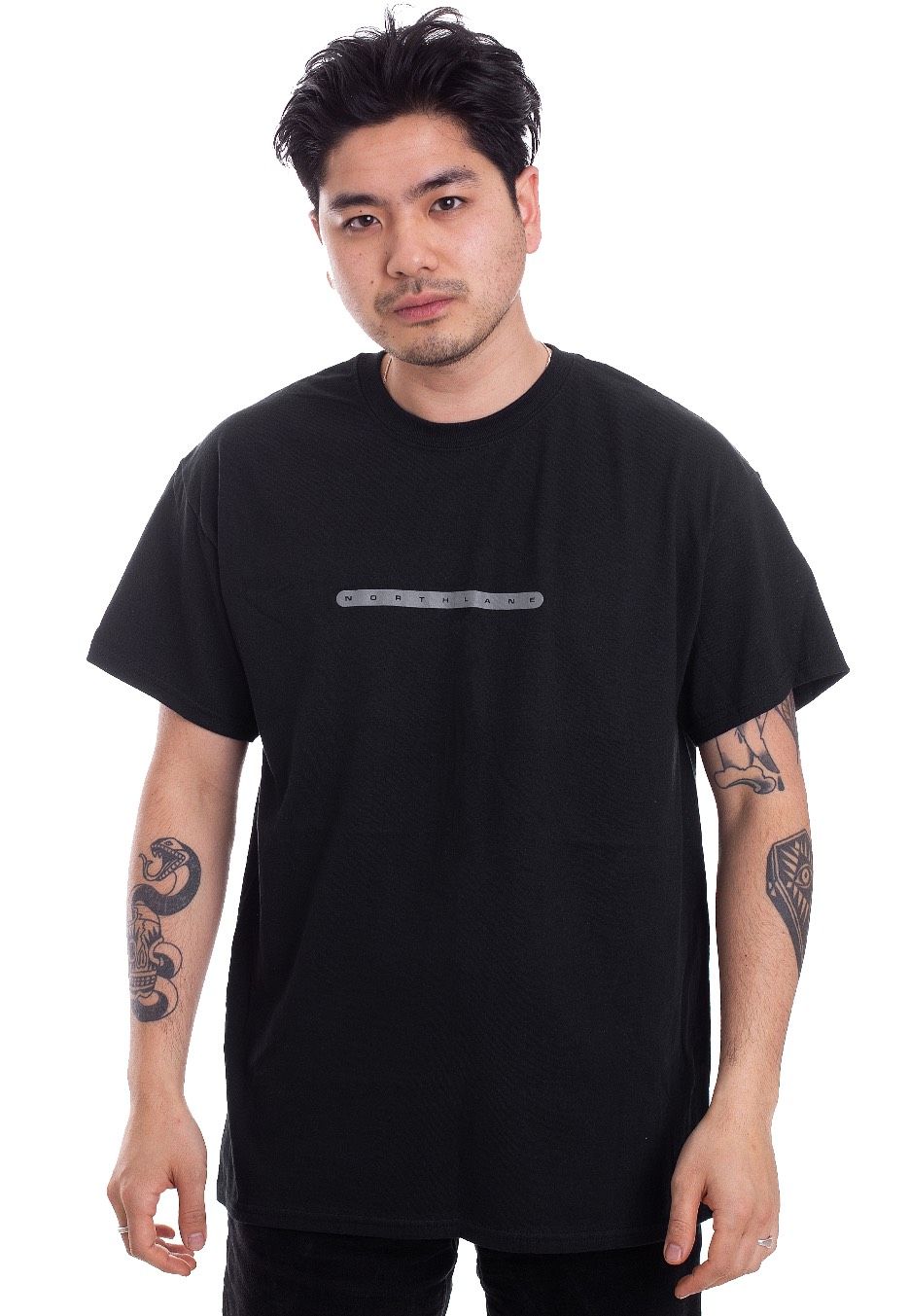 Black t-shirt with a thin grey Northlane logo in the middle of the chest.