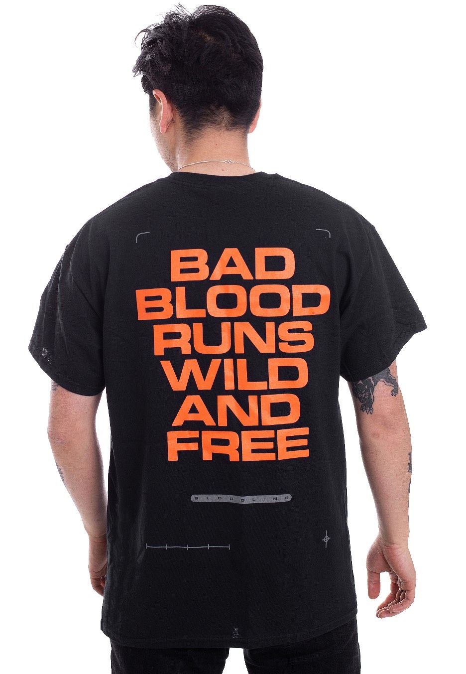 Black t-shirt with large orange lettering on the back that reads "Bad blood runs wild and free" with a small northane logo underneath.