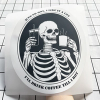 Custom DTF transfer ready to press featuring a skeleton drinking coffee graphic design