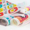 Printed DTF transfer film sheets with vibrant color ink output for t-shirts