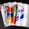 Multiple colorful custom iron on transfers ready to press for t-shirt printing