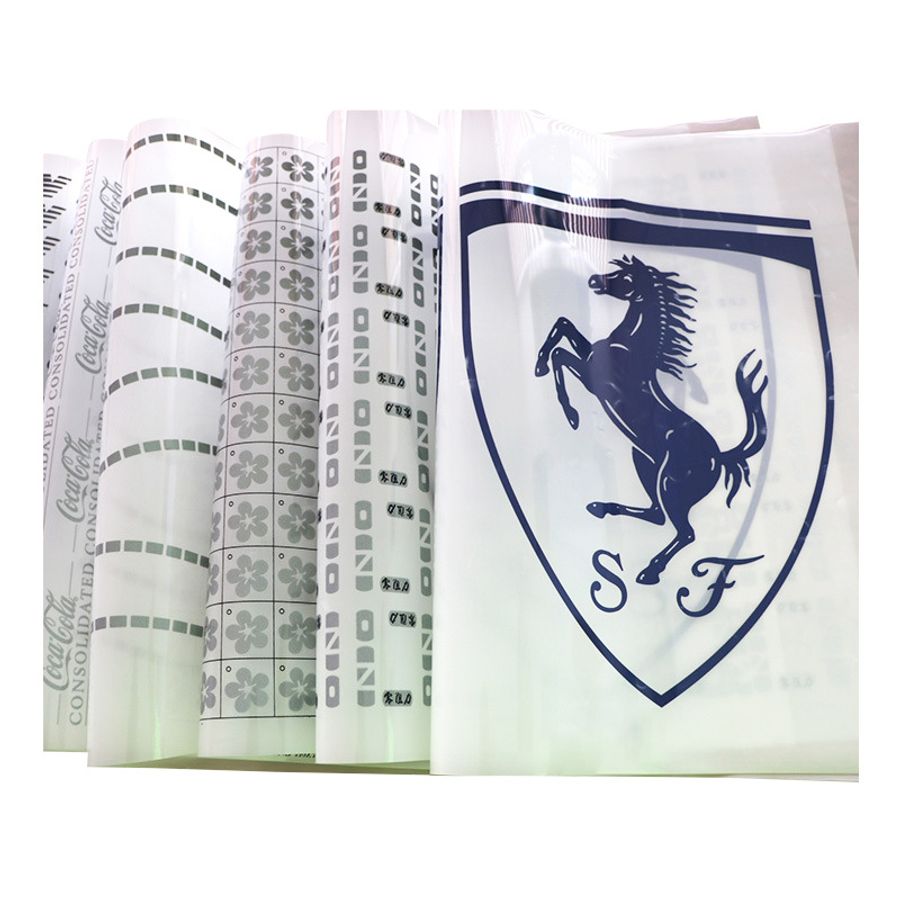 Rolls of custom printed reflective logo heat transfer films ready for mass production