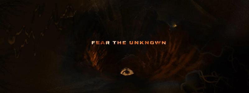 Text reads "Fear the Unknown" above a spooky tunnel like vortex with an eerie glowing center, surrounded by dark, veiny shadows.