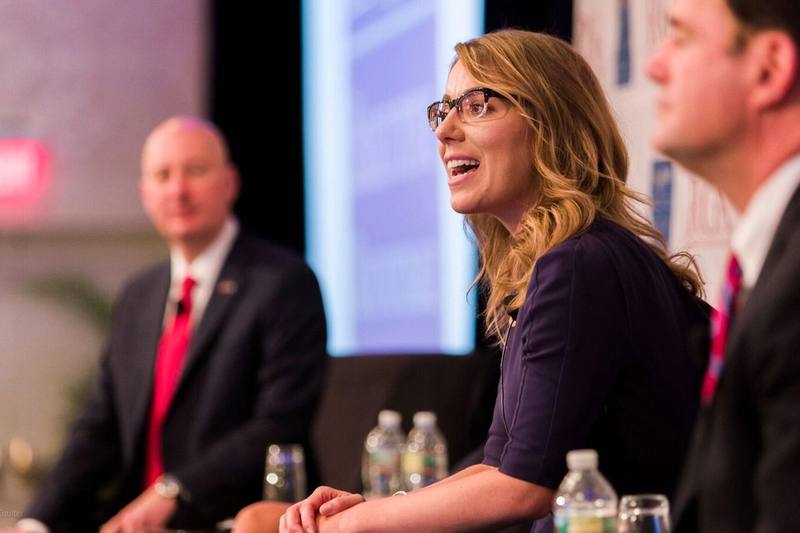 Mattie Duppler speaking on a conference panel