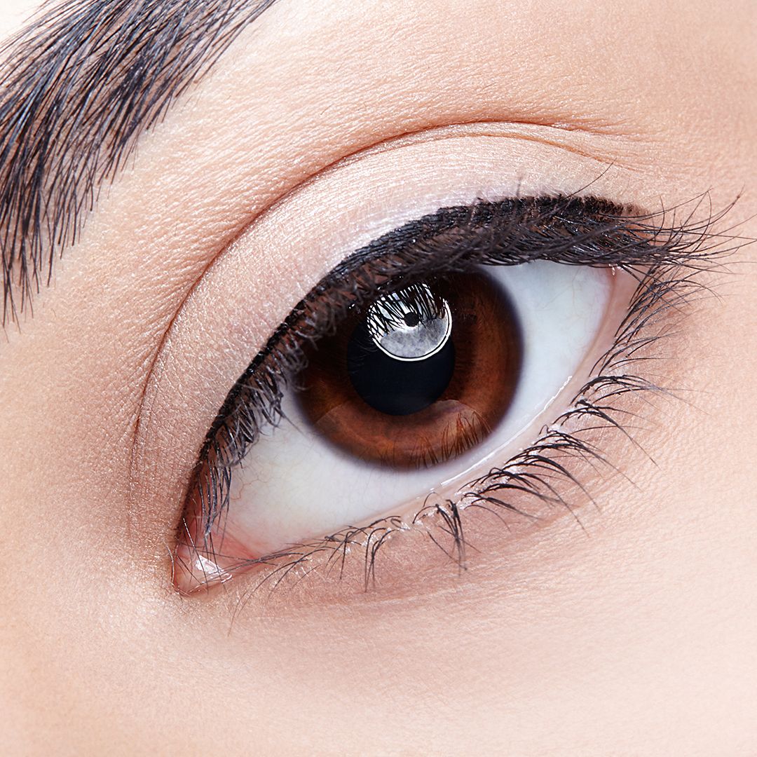 Woman eye permanent makeup lash line enhancement