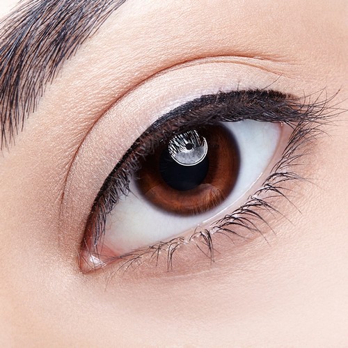 Woman eye permanent makeup lash line enhancement