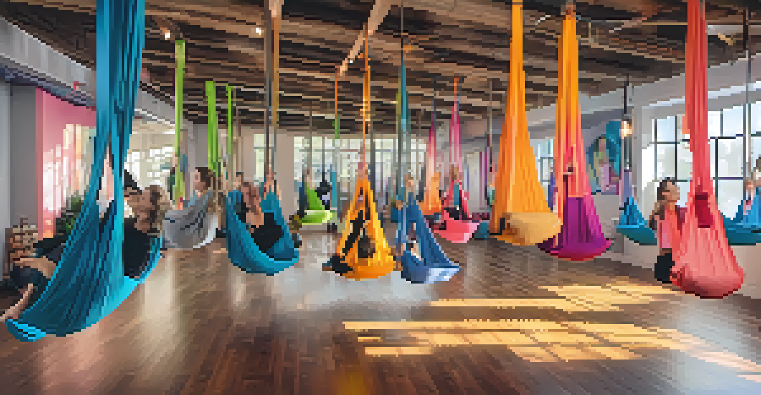 Participants in an aerial yoga class suspended in hammocks, surrounded by colorful artwork and warm lighting.
