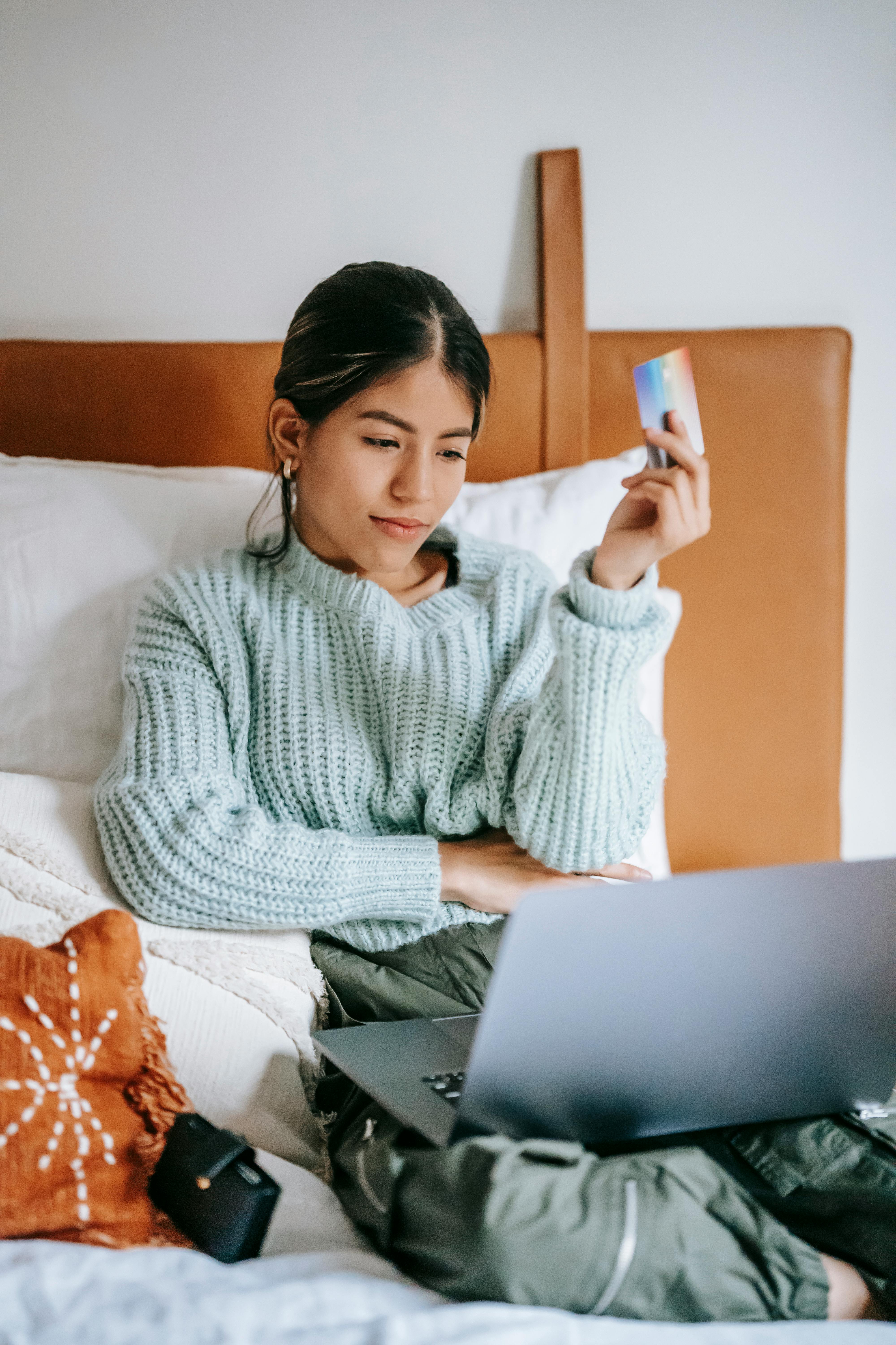 Customer using laptop for online shopping with AI assistance