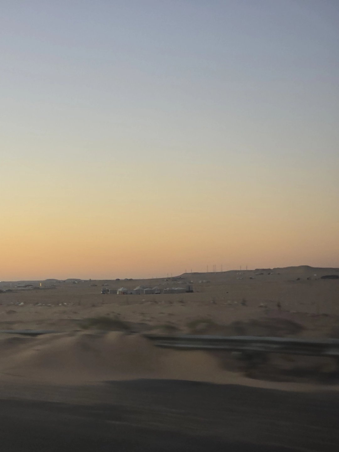 Kuwait after dark: driving into the desert tent camps