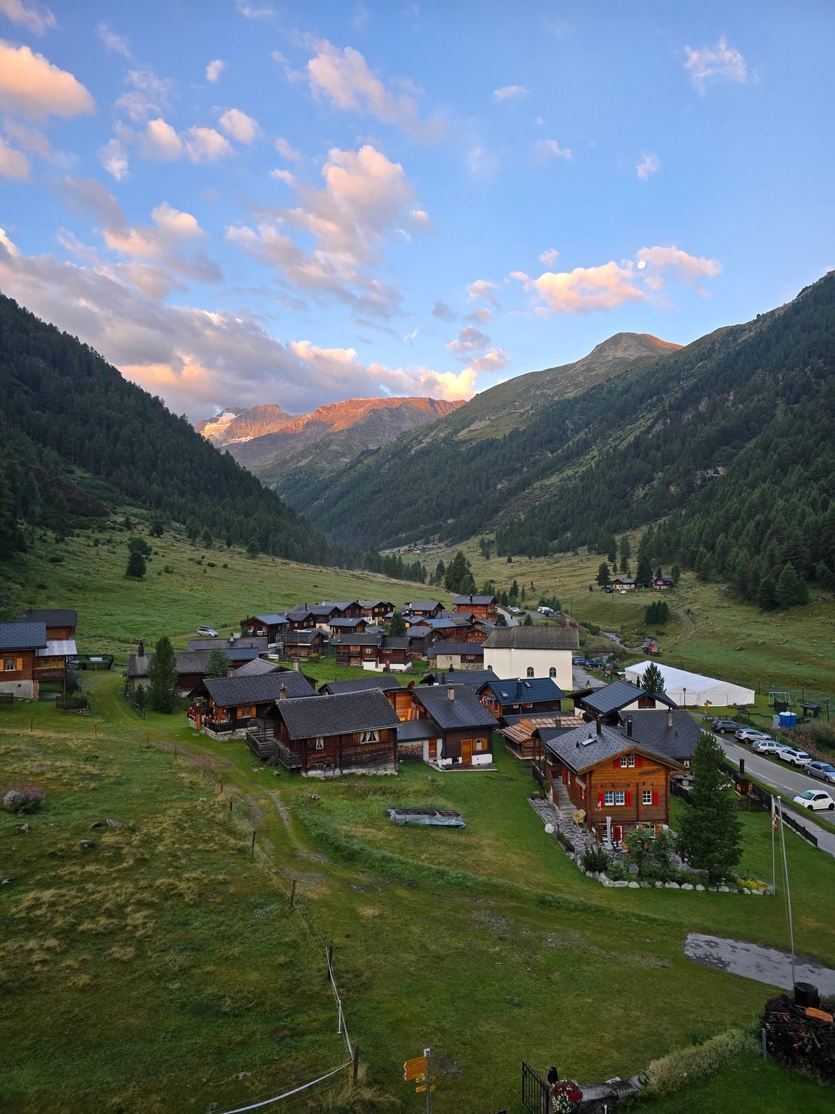 Dawn alpenglow over Gruben in the Turtmanntal