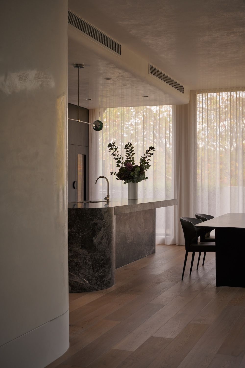 Kitchen glad in black marble designed by MIM Design.   | Straun Residences interior architecture by Mim Design and built by Virgon Constructions | Mim Design | Toorak, Victoria | Architectural Photography Veeral Patel