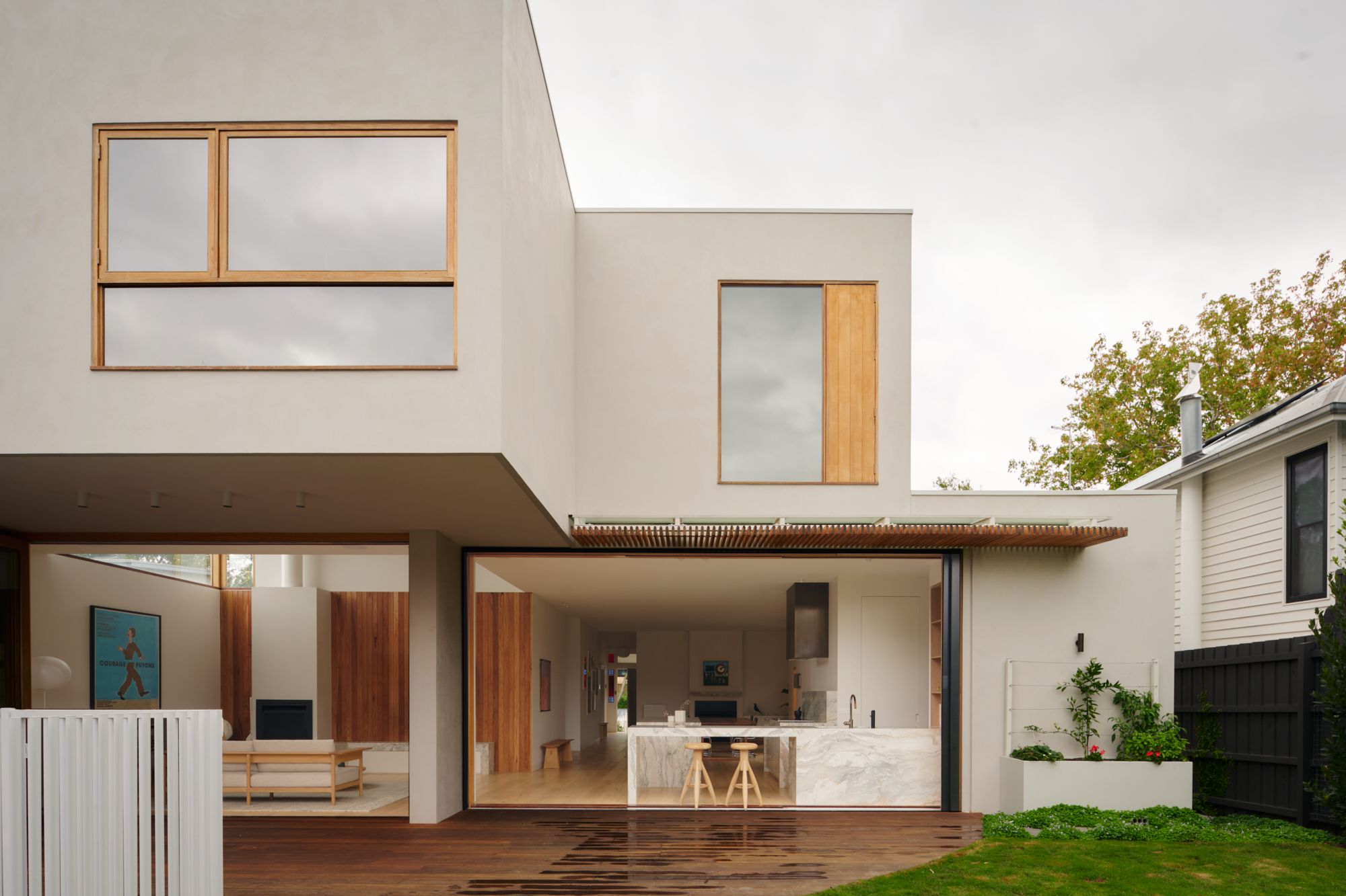 An elevation view of the rear of the house. Showing the cantilevered section of the house with the open plan living spaces.  | College Street by RCA Studio and Built By Manor | Hawthorn | Veeral Patel