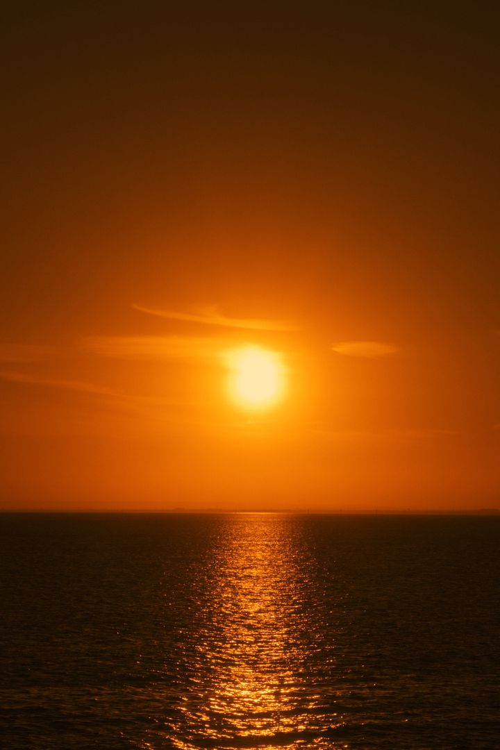 Sun setting in Port Philip Bay.  The International, Brighton developed by Landream & V-Leader | Architecture by Carr | Architectural Film by Veeral Patel