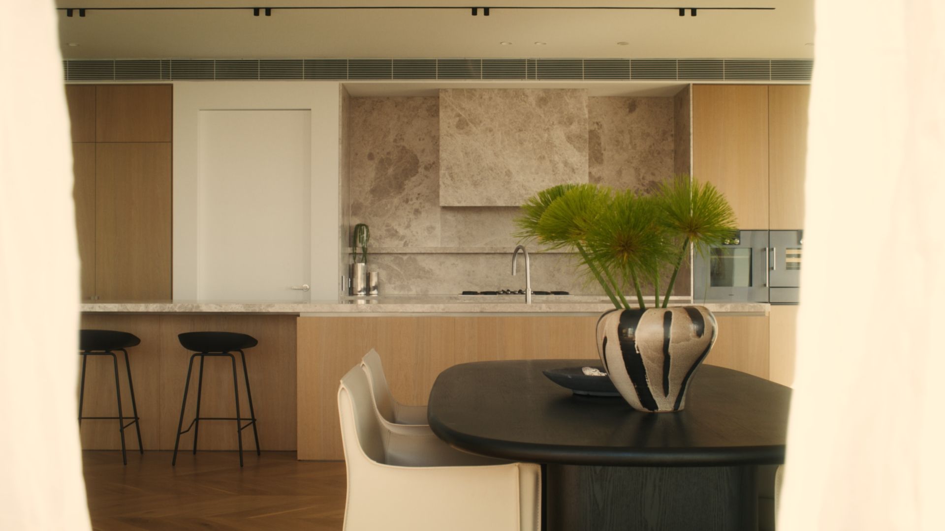 The kitchen of a penthouse apartment inside The International, Brighton.  | The International, Brighton developed by Landream & V-Leader | Architecture by Carr | Architectural Film by Veeral Patel