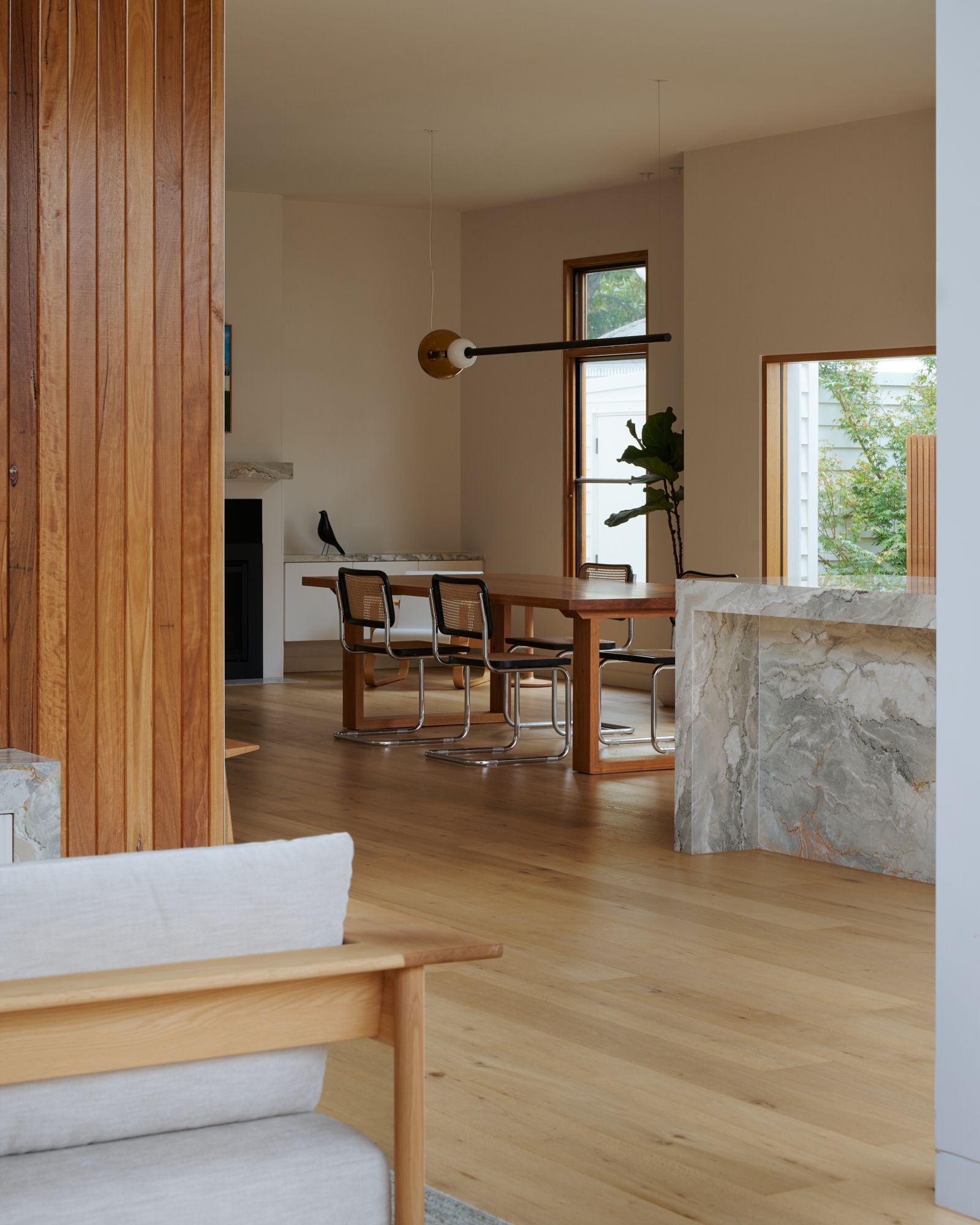 Looking towards the dinning table and a portion of the kitchen island.   | College Street by RCA Studio and Built By Manor | Hawthorn | Veeral Patel
