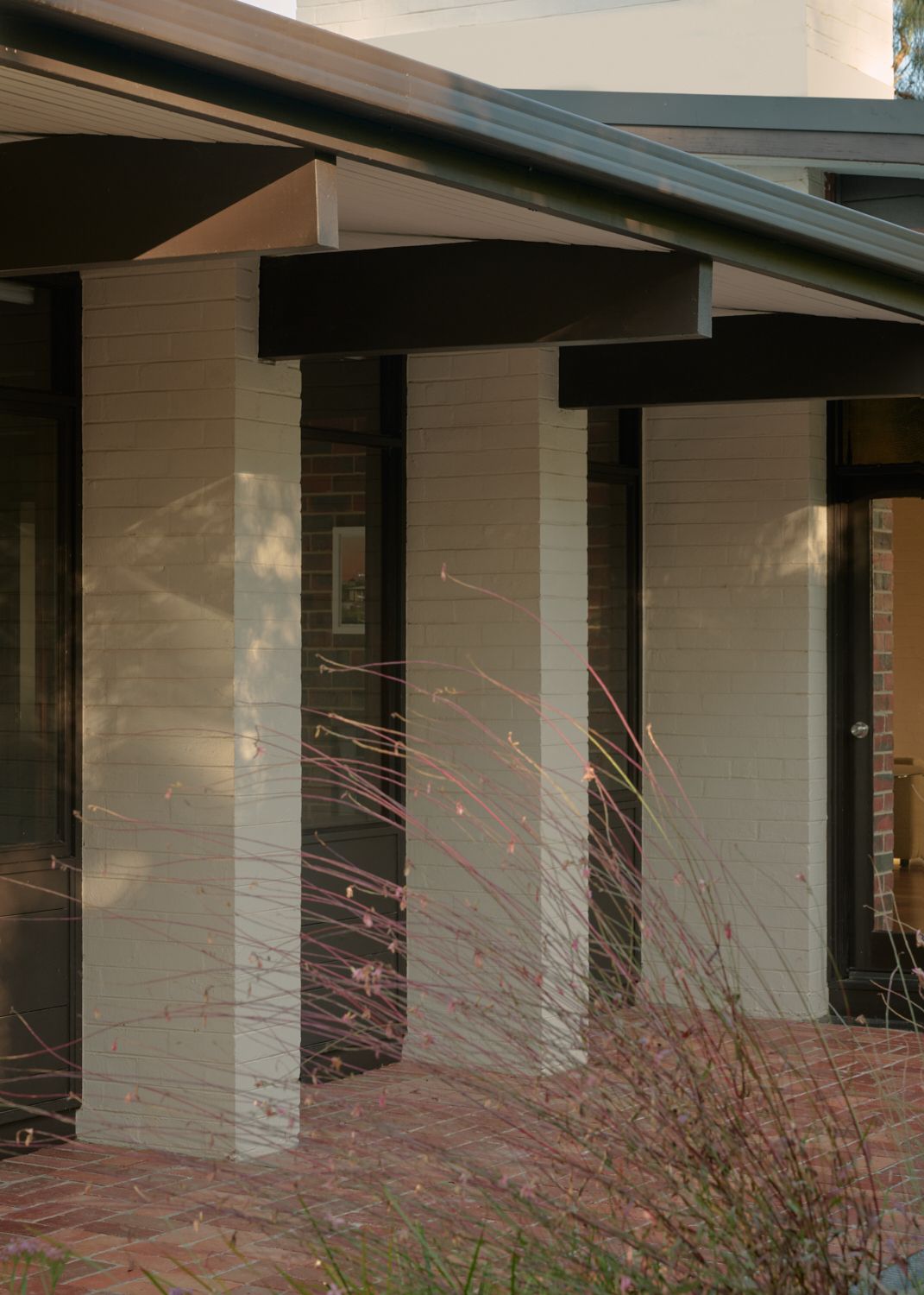 Early morning winter light shimmering on the colonnades of Wildwood. | Wildwood by Robin Boyd | Vermont, Victoria | Noble family | Architectural Photography by Veeral Patel