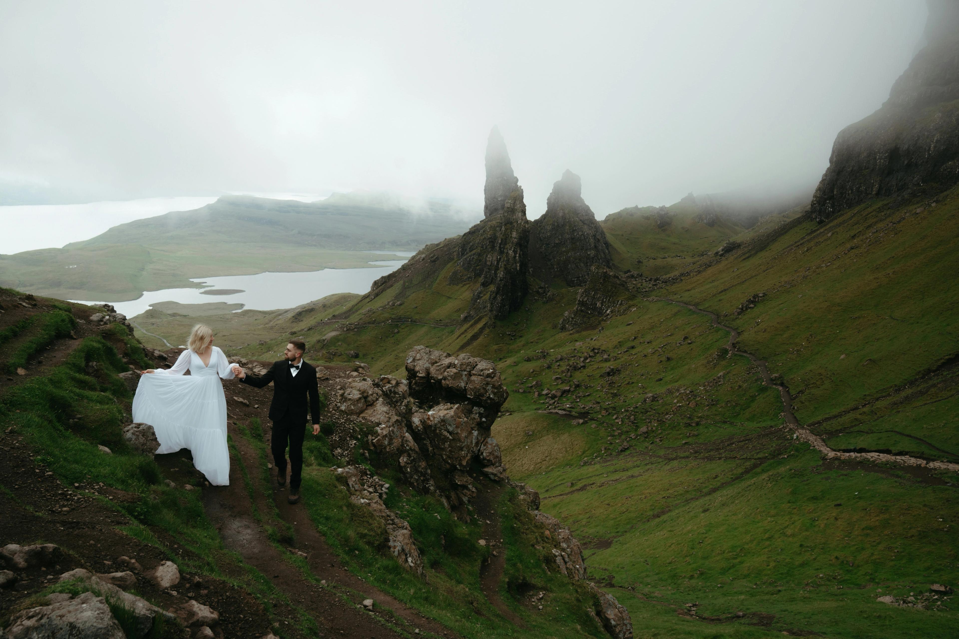 Couple embracing on a mountain ridge