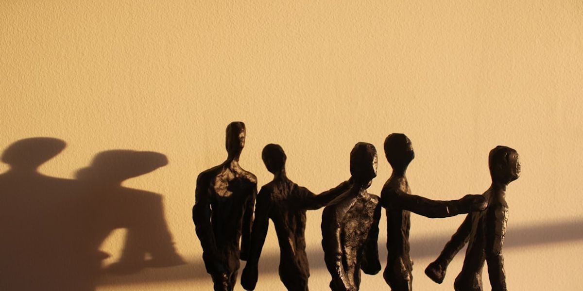 a shadow of a group of people