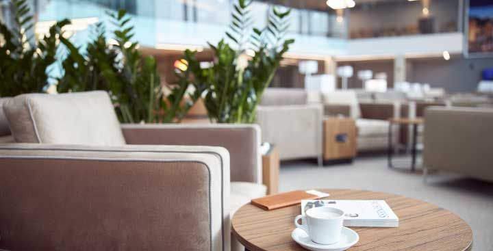 Comfy seat and coffee in an airport lounge