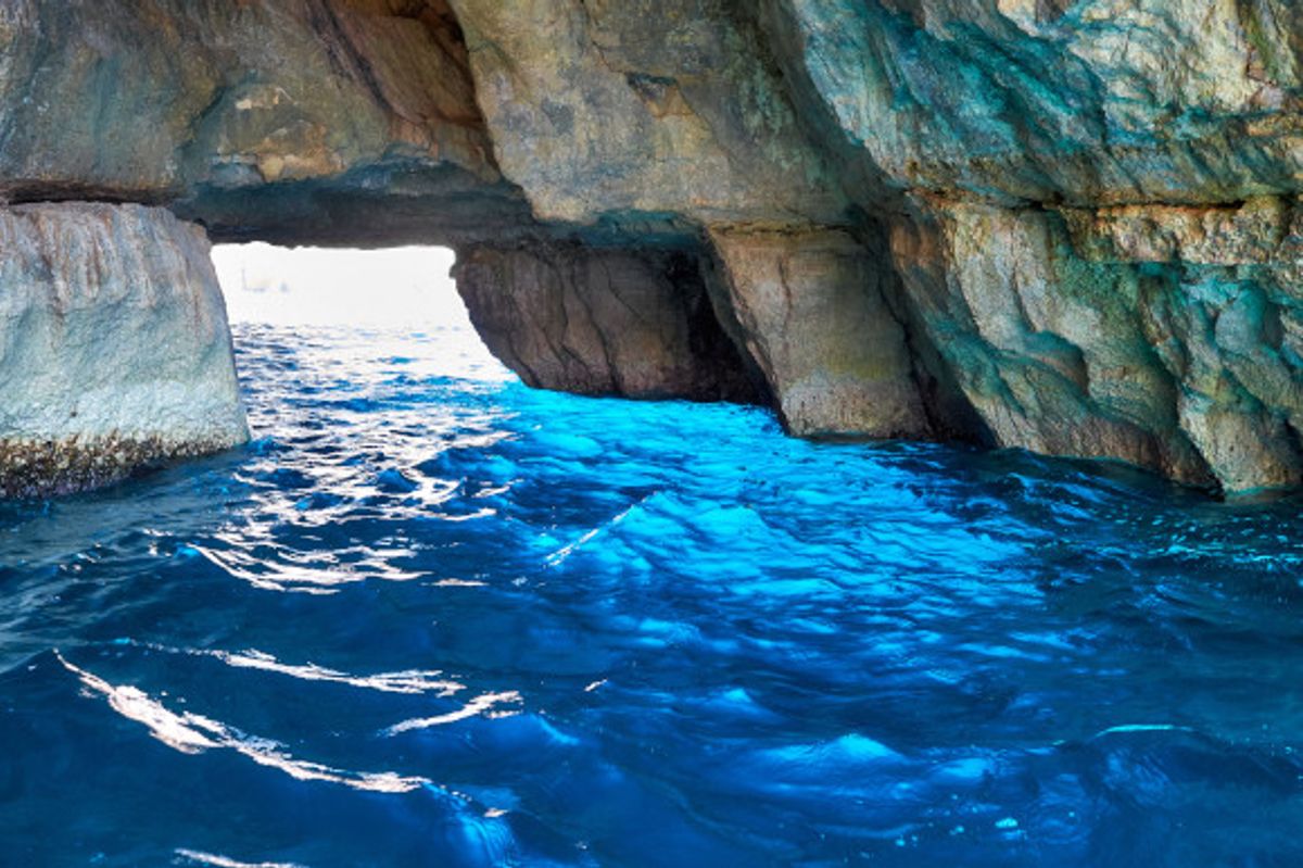 The Blue Grotto in Malta and its stunning Mediterranean water surroundings